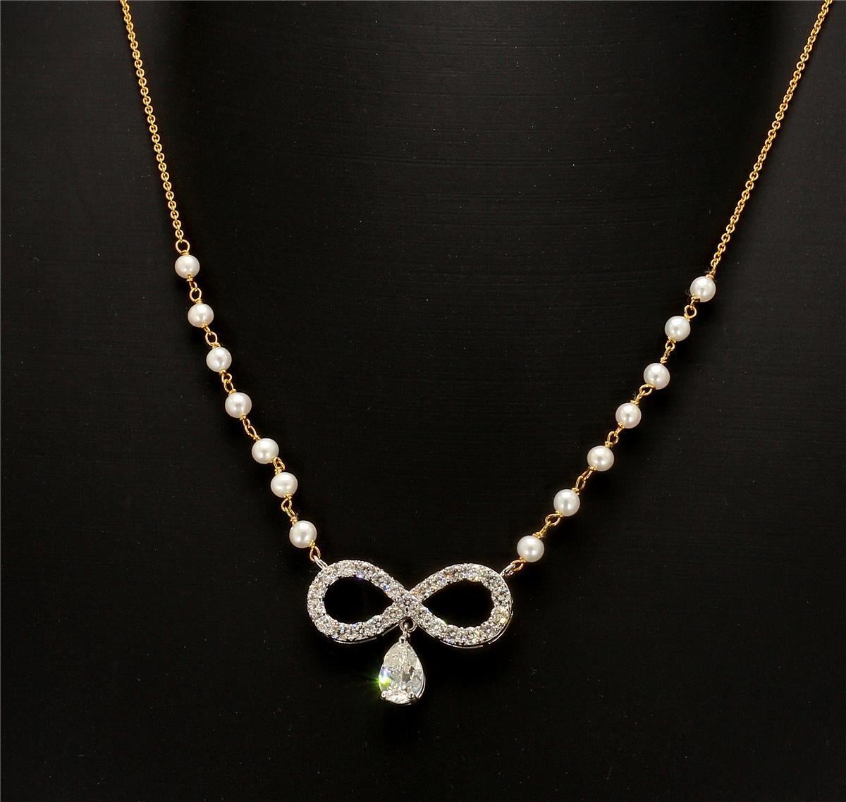 **All jewellery is hallmarked with gold purity and diamond weight for your peace of mind**

**This design is one-of-a-kind and may not be reproduced, this is handmade**

This stunning Infinity design necklace is crafted with natural diamonds and