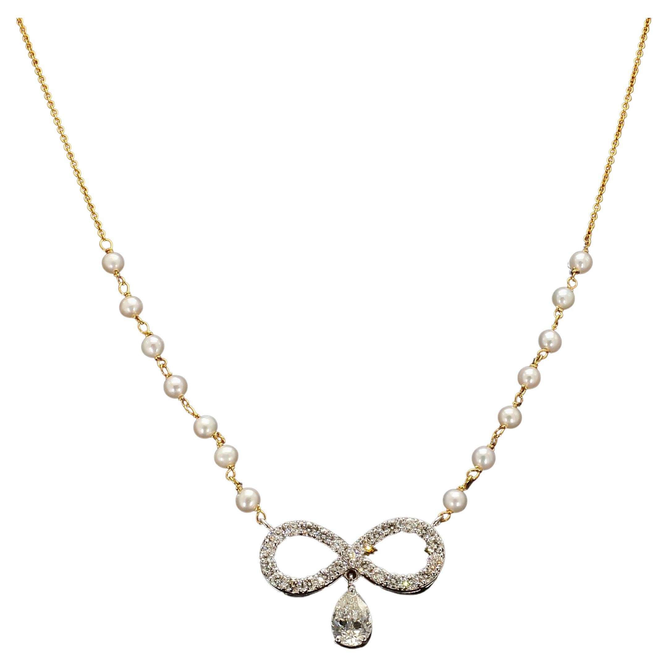 Infinity design natural diamonds and gold pendant with pearls
