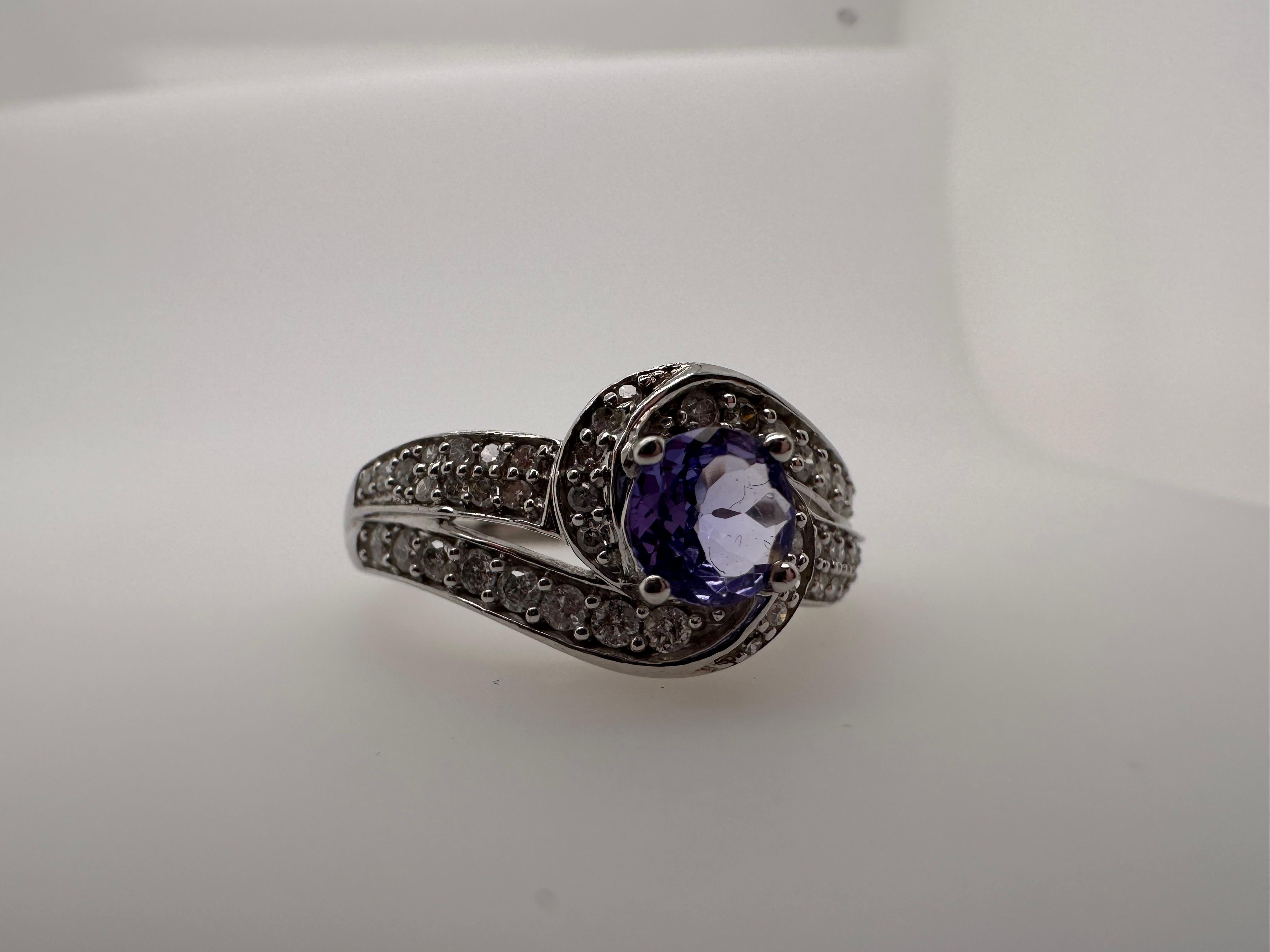 infinity Diamond ring 10KT white gold NATURAL tanzanite In Excellent Condition For Sale In Boca Raton, FL
