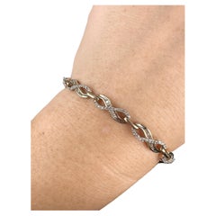 Infinity Diamond Tennis Bracelet in 10 Karat Yellow Gold