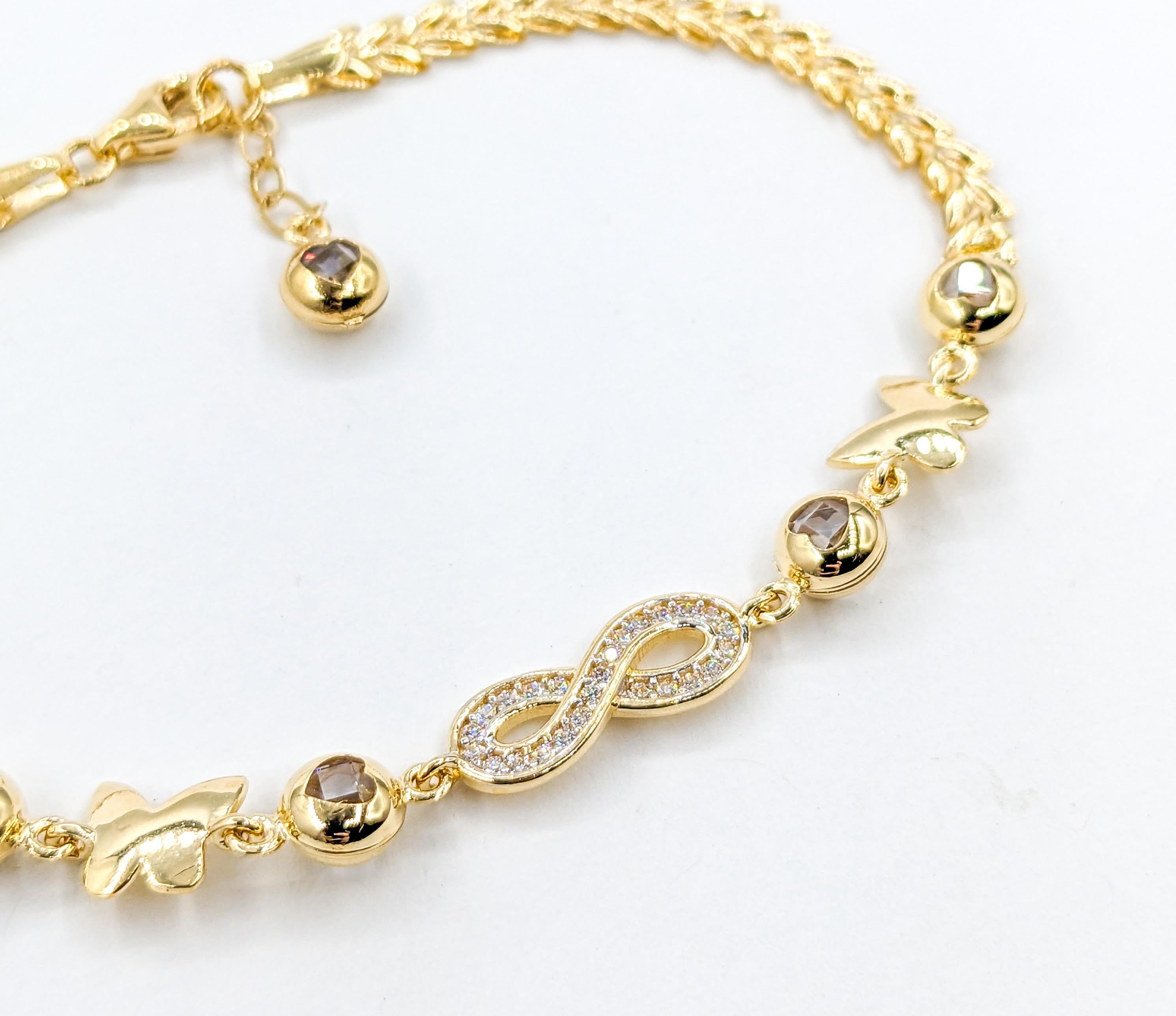 Infinity, Hearts & Butterflies CZ Stone Bracelet In Yellow Gold For Sale 4