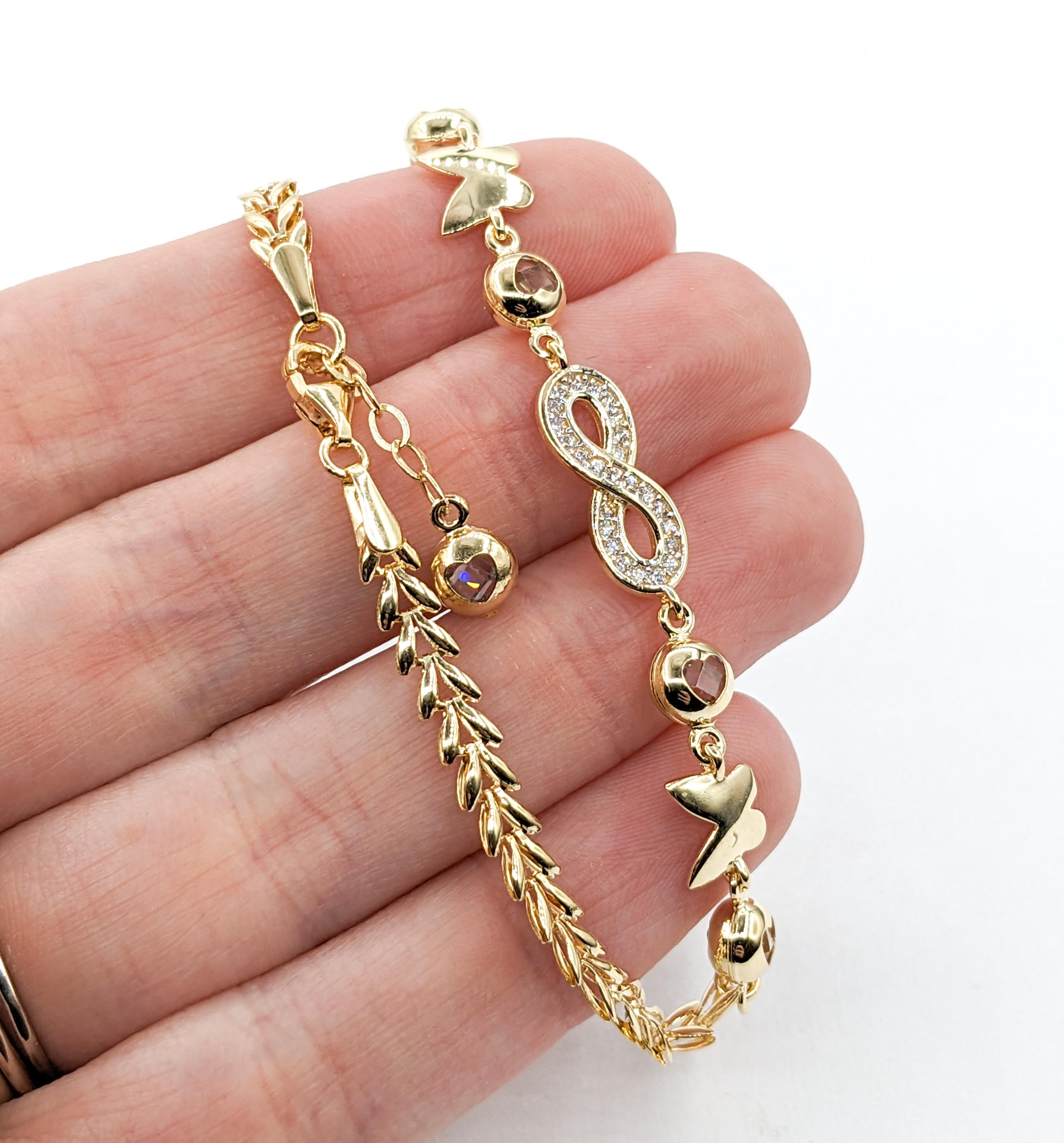Women's Infinity, Hearts & Butterflies CZ Stone Bracelet In Yellow Gold For Sale