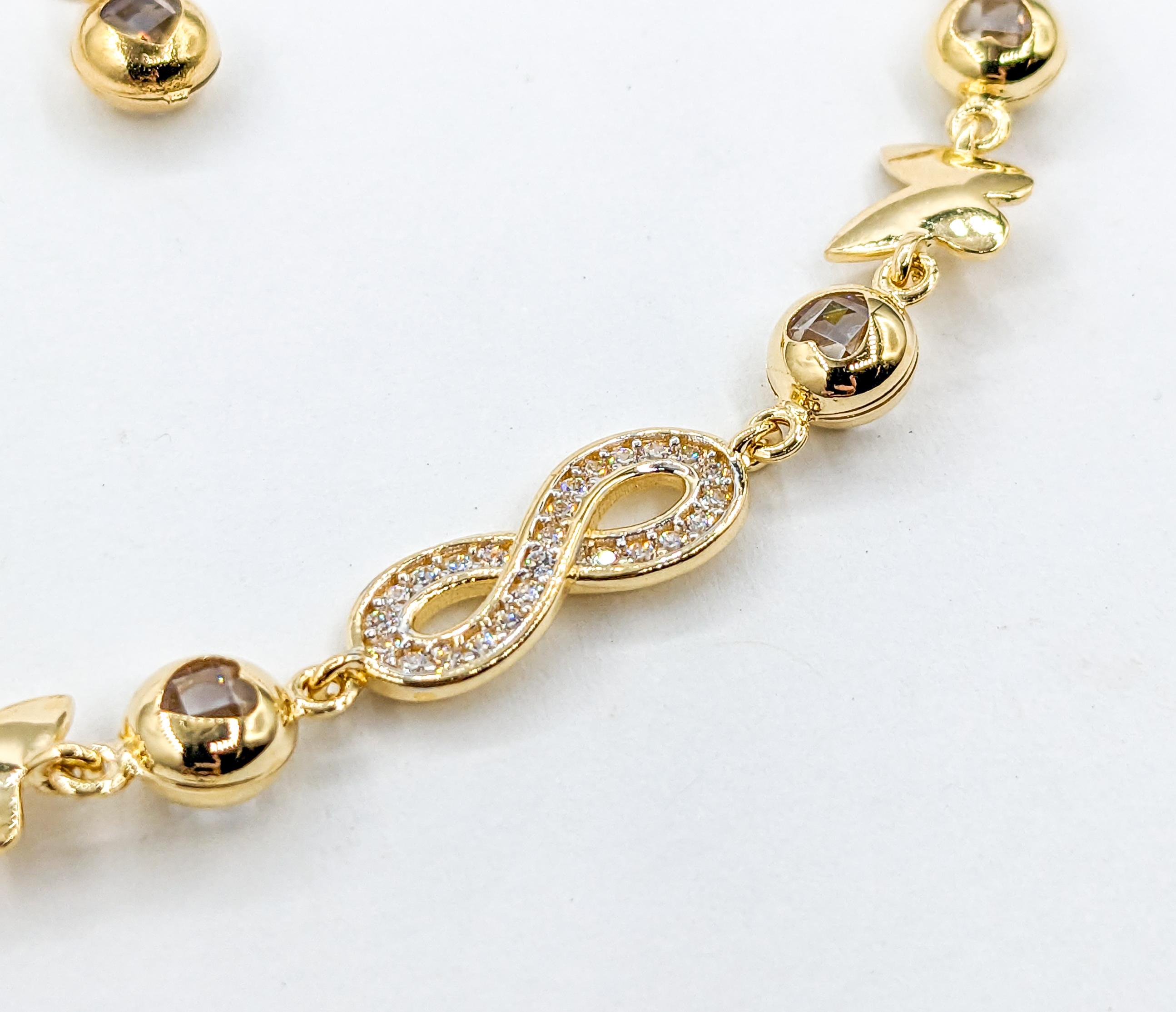 Infinity, Hearts & Butterflies CZ Stone Bracelet In Yellow Gold For Sale 3