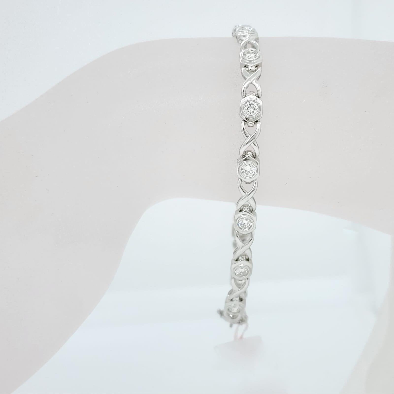 Beautiful white gold infinity link bracelet with 1.60 ct. good quality white diamond rounds.  Handmade in 18k white gold.  Length is 7.25