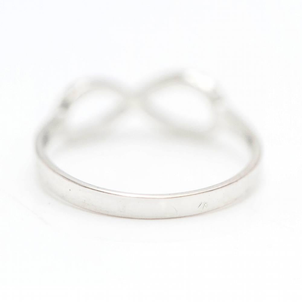Taglio brillante Anello INFINITY in oro bianco e diamanti in vendita