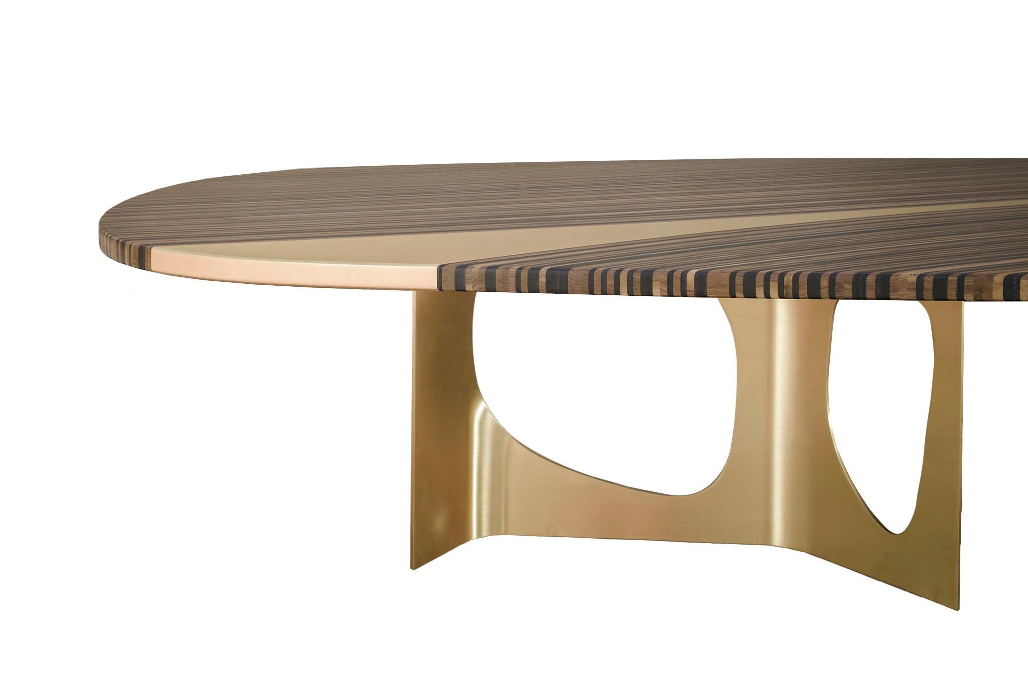 Infinity, Georges Mohasseb design, 2018
Inspired by the timeless designs of Art Deco and Art Nouveau, the Infinity dining table is designed to be an art piece. The tabletop is a solid wood top, veneered with multi-layered stripes of American Walnut