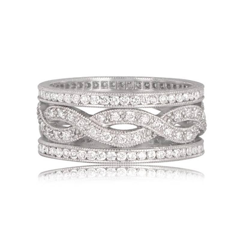 Experience the allure of this vintage-style infinity twist estate wedding band, featuring two intertwined bands adorned with micropavé diamonds. The surrounding two rows are meticulously channel-set in platinum, showcasing beautiful engravings and