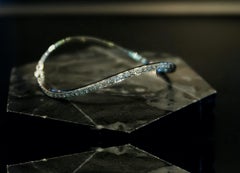 Infinity Twisted White Diamond Bangle Bracelet in 18K Gold