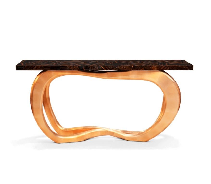 Boca do Lobo's furniture exhales style, grace and luxury and this is certainly the case for Infinity console, a fascinating and exclusive piece, proven to be impressive and eye-catching through its sinuous and elegant lines. Infinity holds a