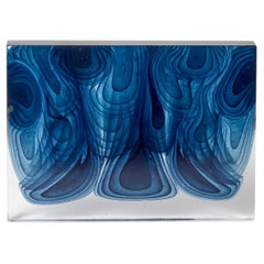 Infusion, an abstract fluid blue & clear cast glass sculpture by Helen Restorick