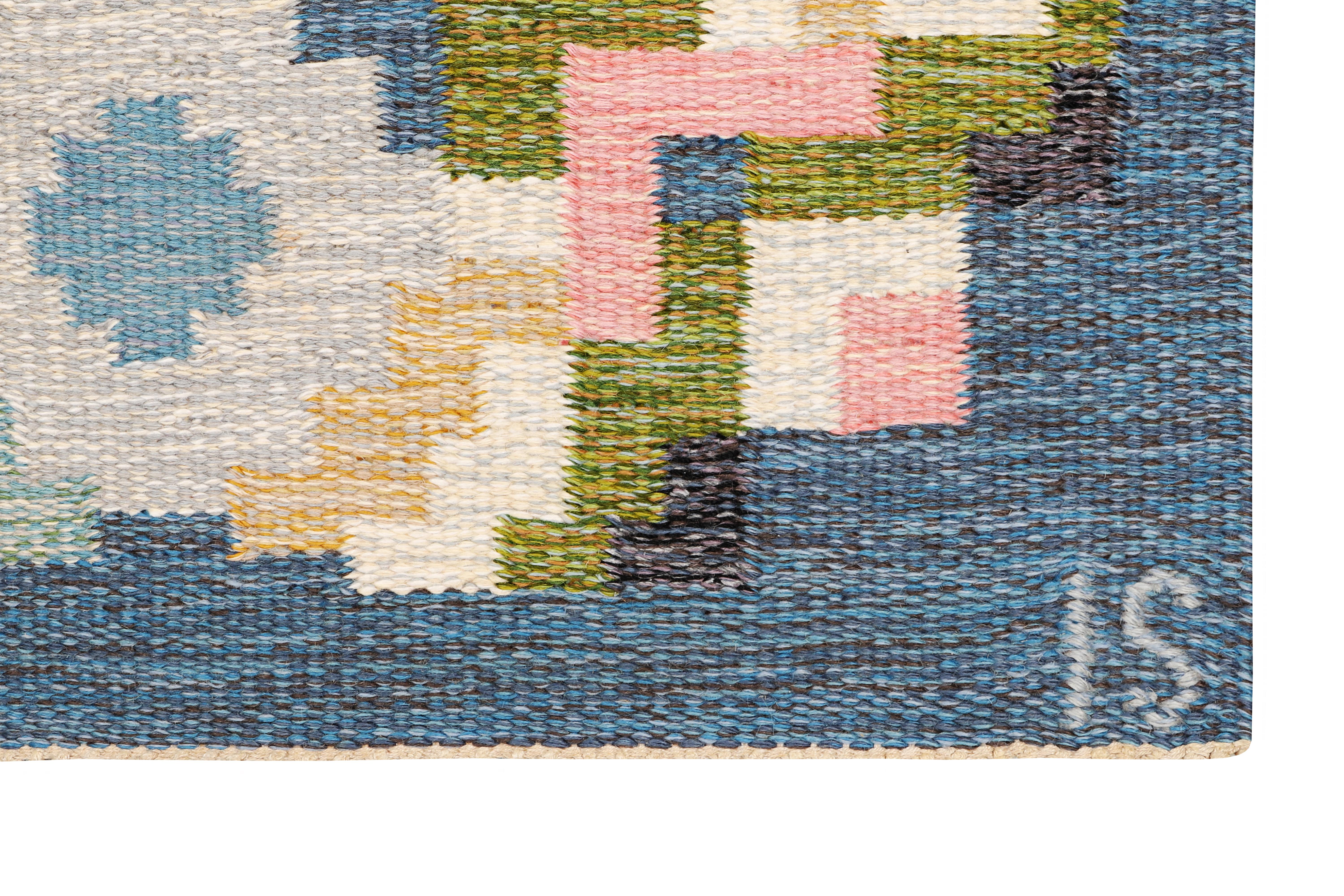 Handwoven in 1969, this striking rölakan flatweave rug was designed by Ingegerd Silow (1916–2005), one of Sweden’s most influential textile artists. Crafted in wool with linen warp, the piece reflects Silow’s refined sense of Scandinavian Modern