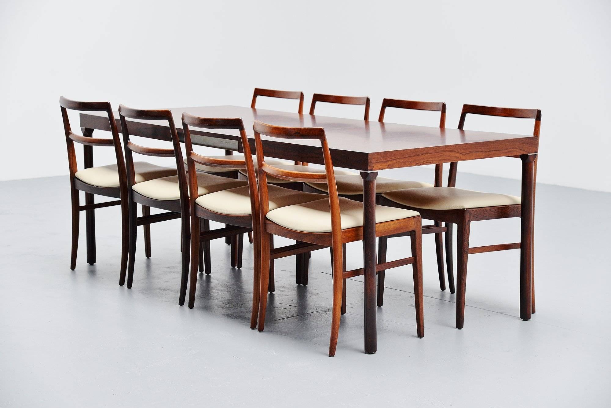 Very nice extendable dining table designed by Inger Klingenberg for Fristho Franeker, Holland, 1960. This rosewood dining table has some very nice details, on the corners you will find some nice detailed dovetail connections and a metal square tag