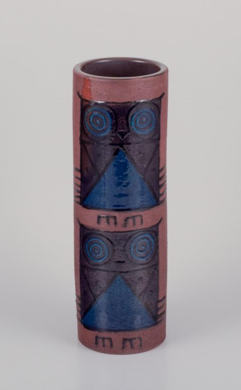 Inger Persson (1936-2021) for Rörstrand Atelje, Sweden. 
Large ceramic vase. Cylinder-shaped. Decorated with owls.
1970s.
Marked.
In perfect condition, with a very minor chip at the bottom of the vase. Please see the photo.
Dimensions: D 11.0 cm x H
