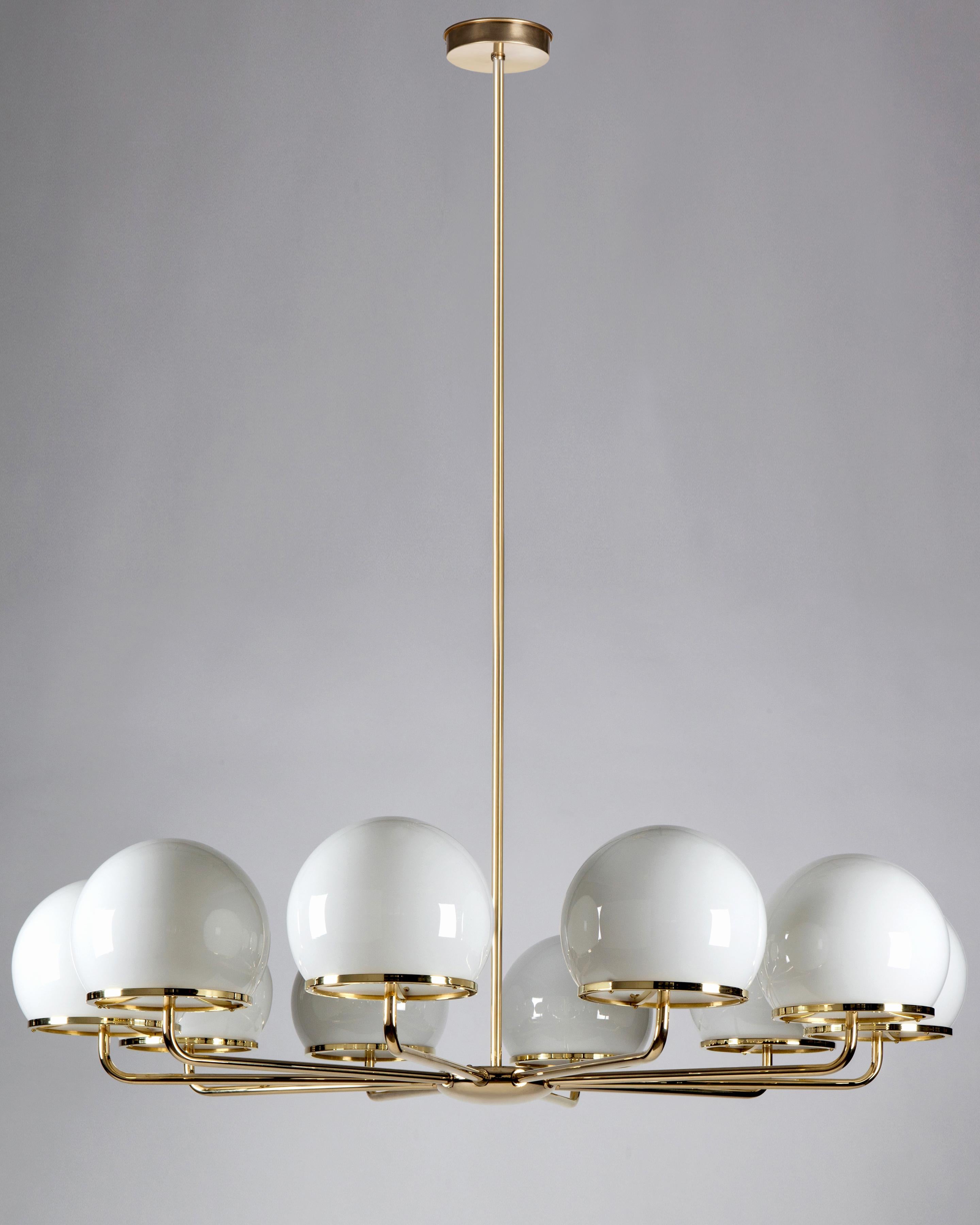 WHL2223.10
The Ingersoll round chandelier by Remains Lighting is a ten arm ceiling fixture with a simple yet elegant form. Refined proportions and exceptional construction describe the rounded cluster and curved arms of the frame, machined from