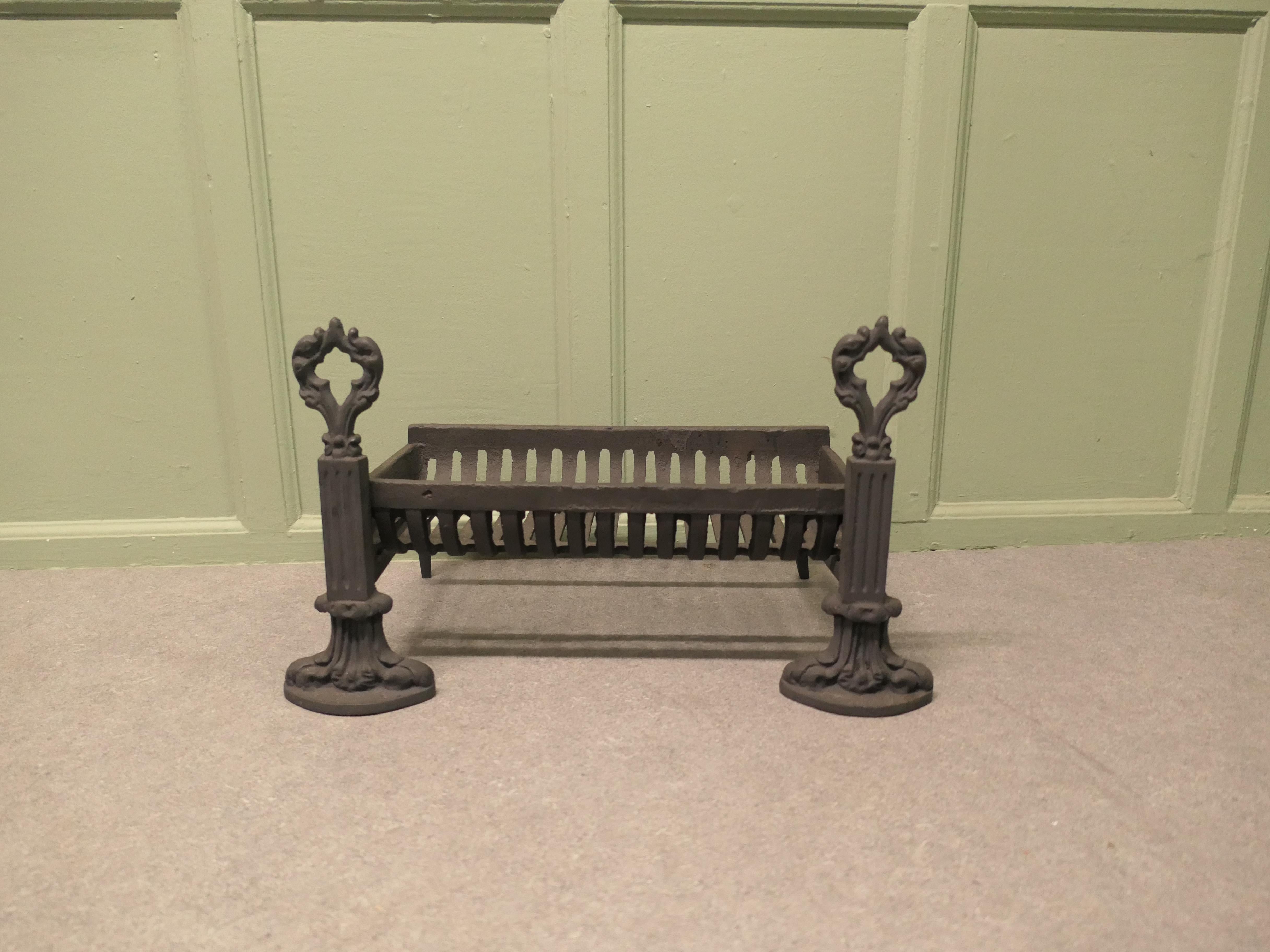 Inglenook Fire Grate on Andirons

This is a attractive Iron Log Grate is supported on a Pair of Iron Andirons
The Grate is in very good condition, the andirons are in a classic regency design and would look superb in an open or Inglenook fire
