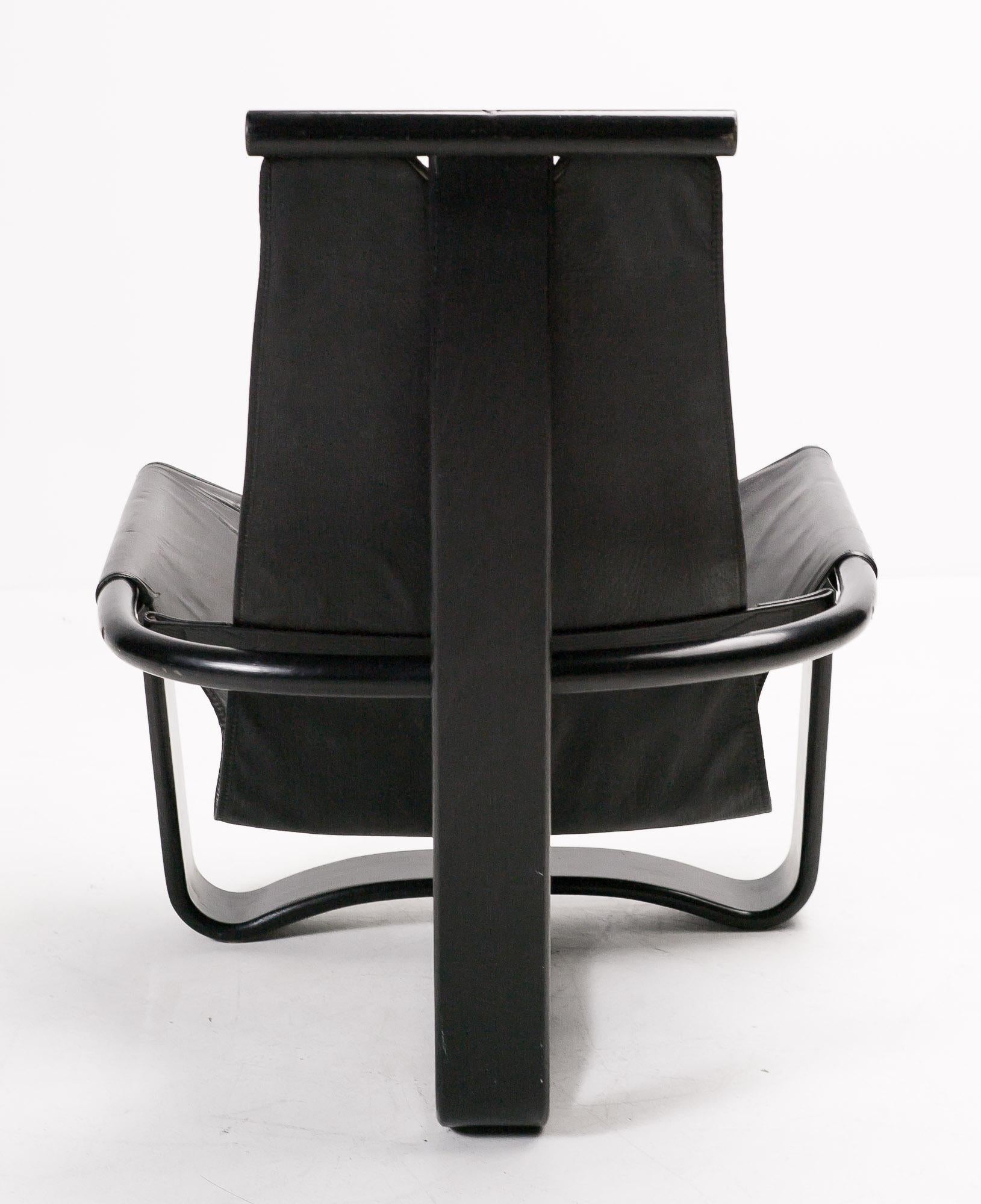 Ingmar Relling for Westnofa Manta high back lounge chair.
Black plywood frame with leather sling upholstery.