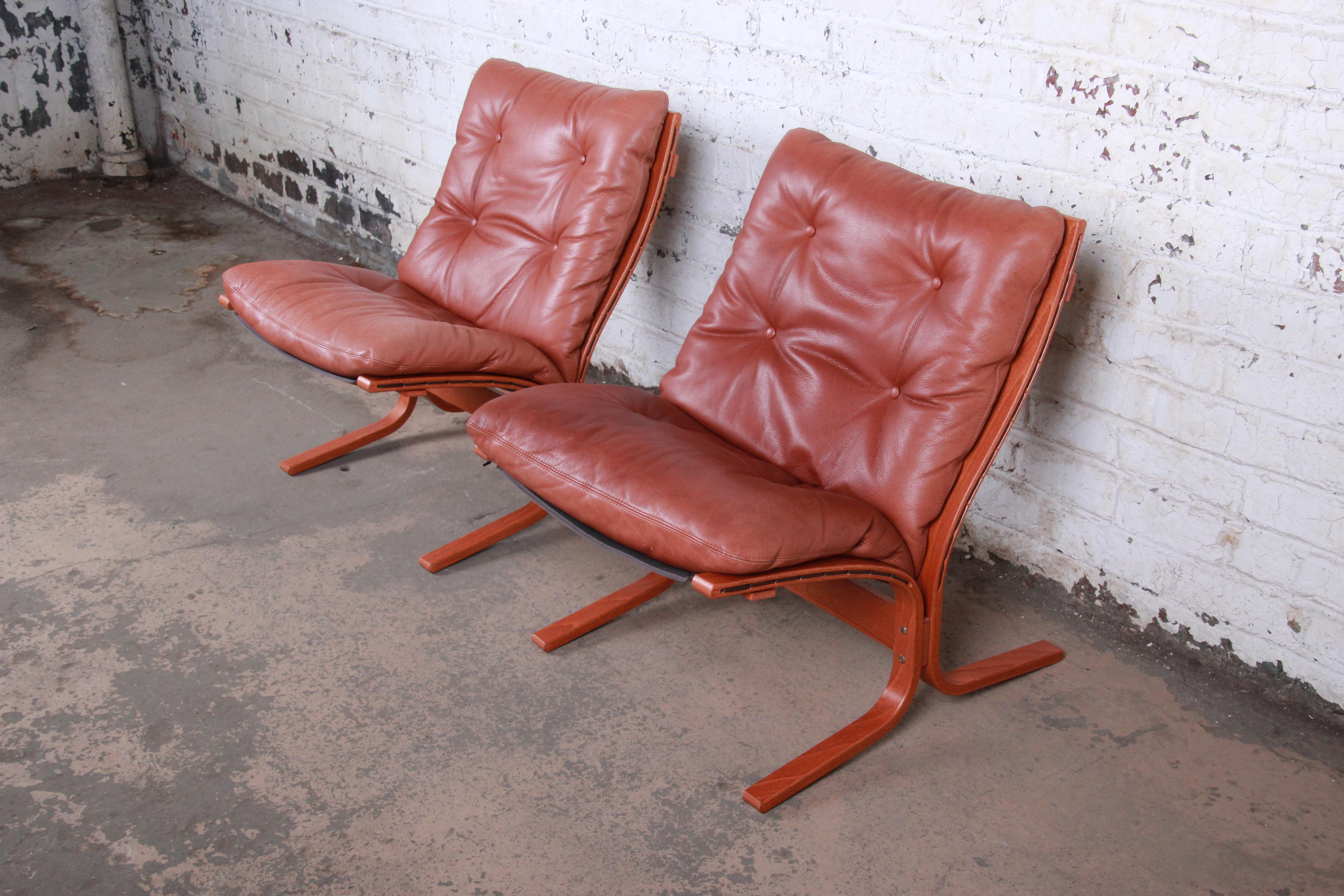 Mid-20th Century Ingmar Relling for Westnofa Teak and Leather Siesta Lounge Chairs and Ottoman