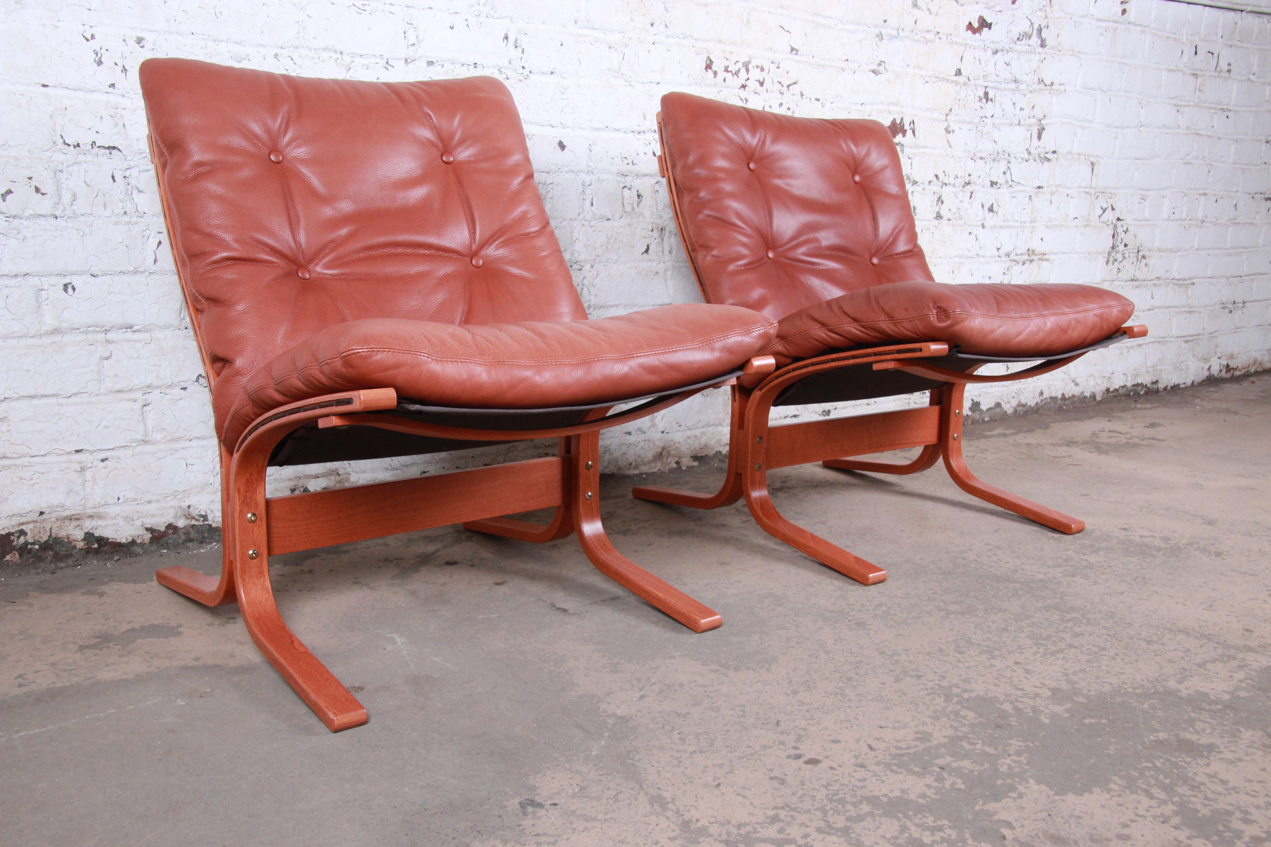 Ingmar Relling for Westnofa Teak and Leather Siesta Lounge Chairs and Ottoman 1