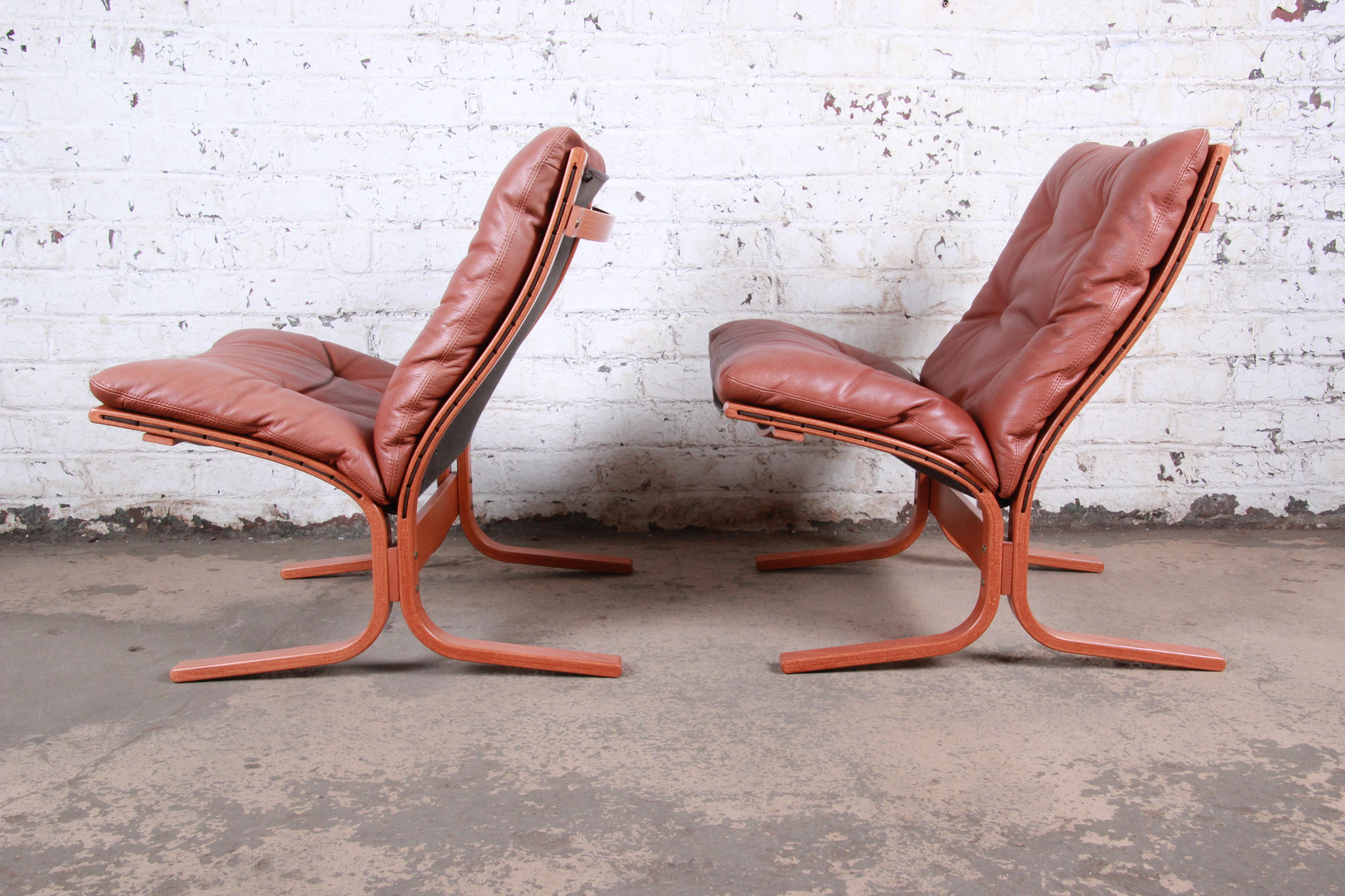 Ingmar Relling for Westnofa Teak and Leather Siesta Lounge Chairs and Ottoman 3