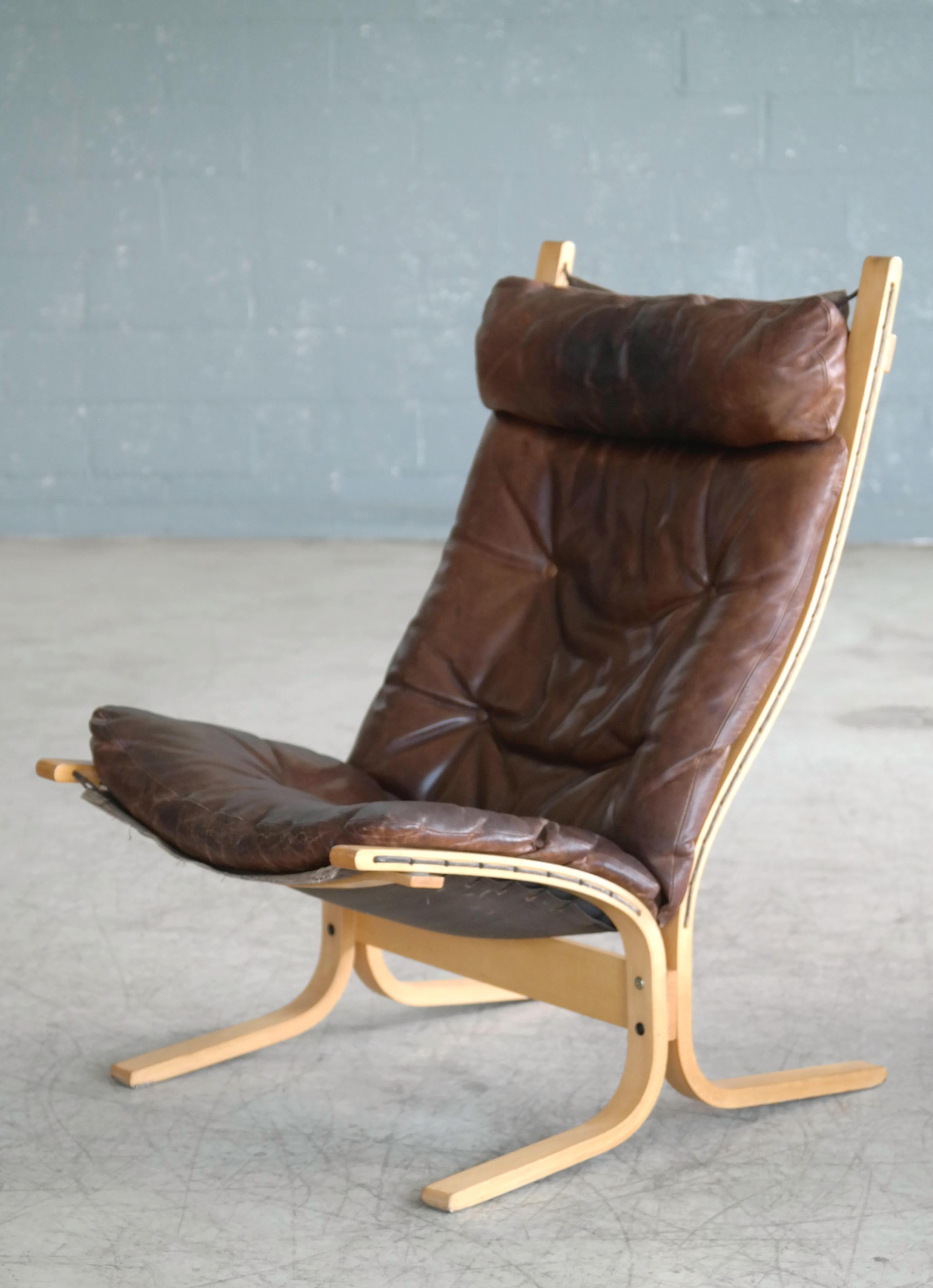 Norwegian Ingmar Relling Siesta Chair with Ottoman in Brown Patinated Leather by Westnofa