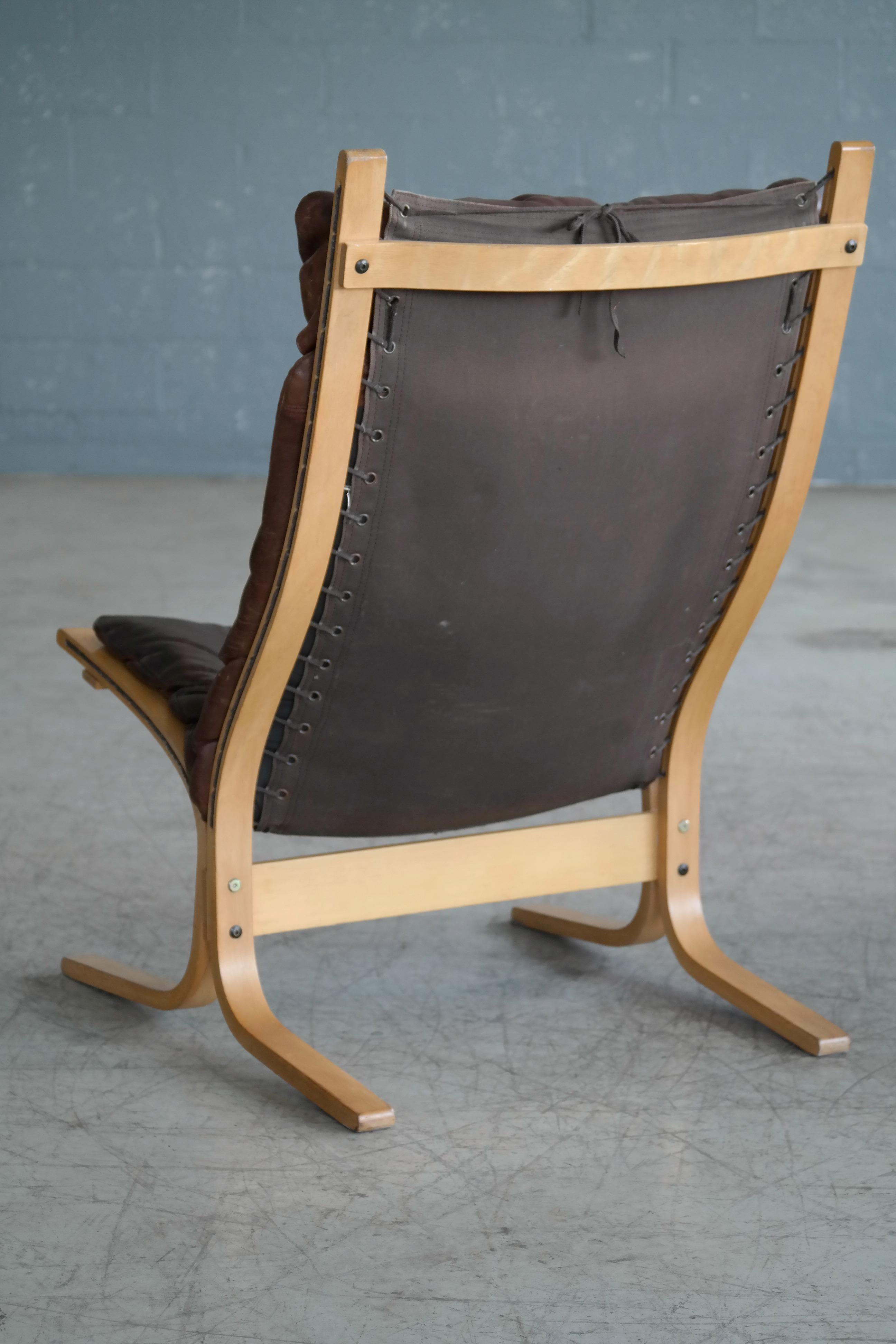 Ingmar Relling Siesta Chair with Ottoman in Brown Patinated Leather by Westnofa In Good Condition In Bridgeport, CT