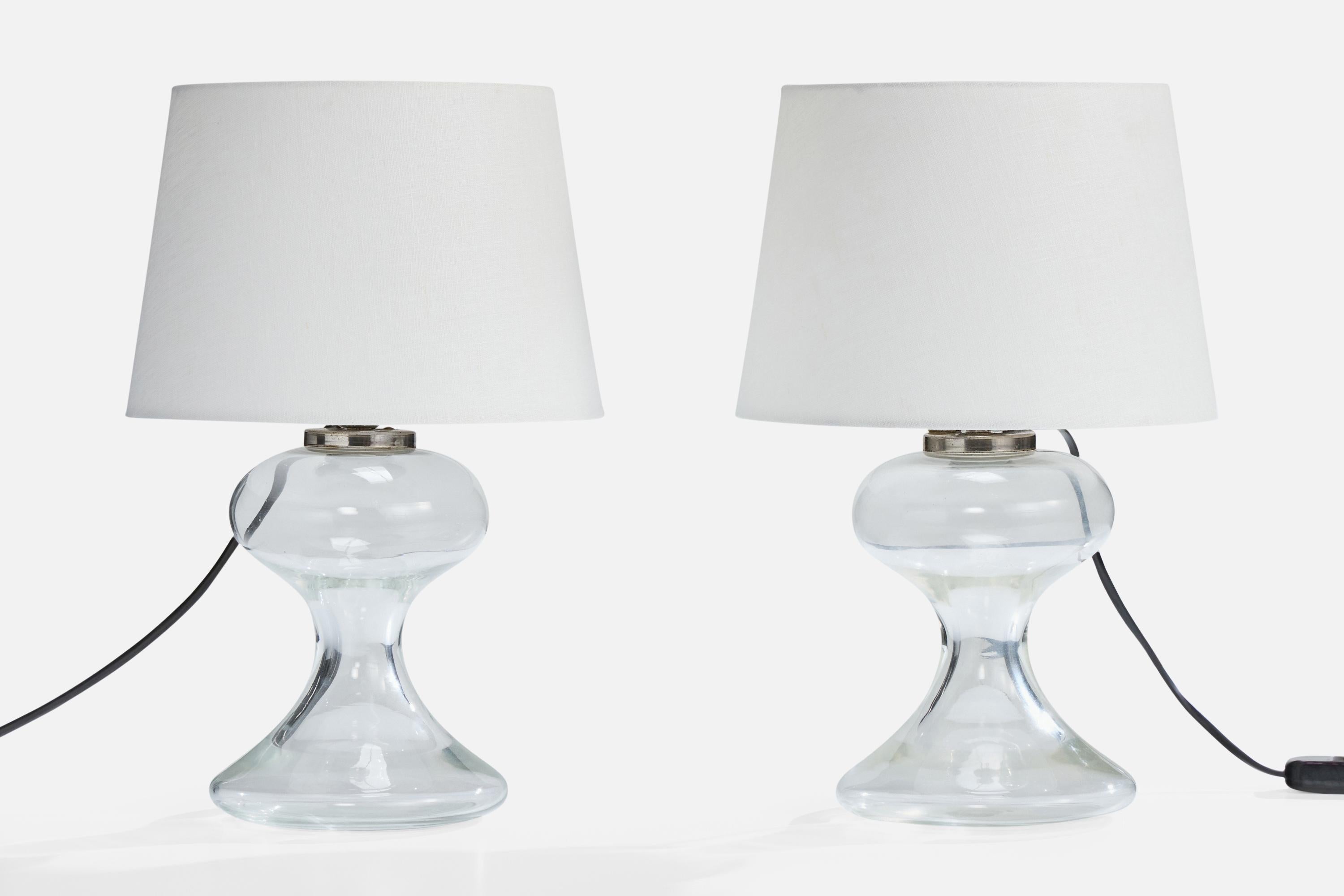 A pair of glass and metal table lamps designed by Ingo Mauer and produced by M-Design, Germany, c. 1970s.

Dimensions of Lamp (inches): 11.75
