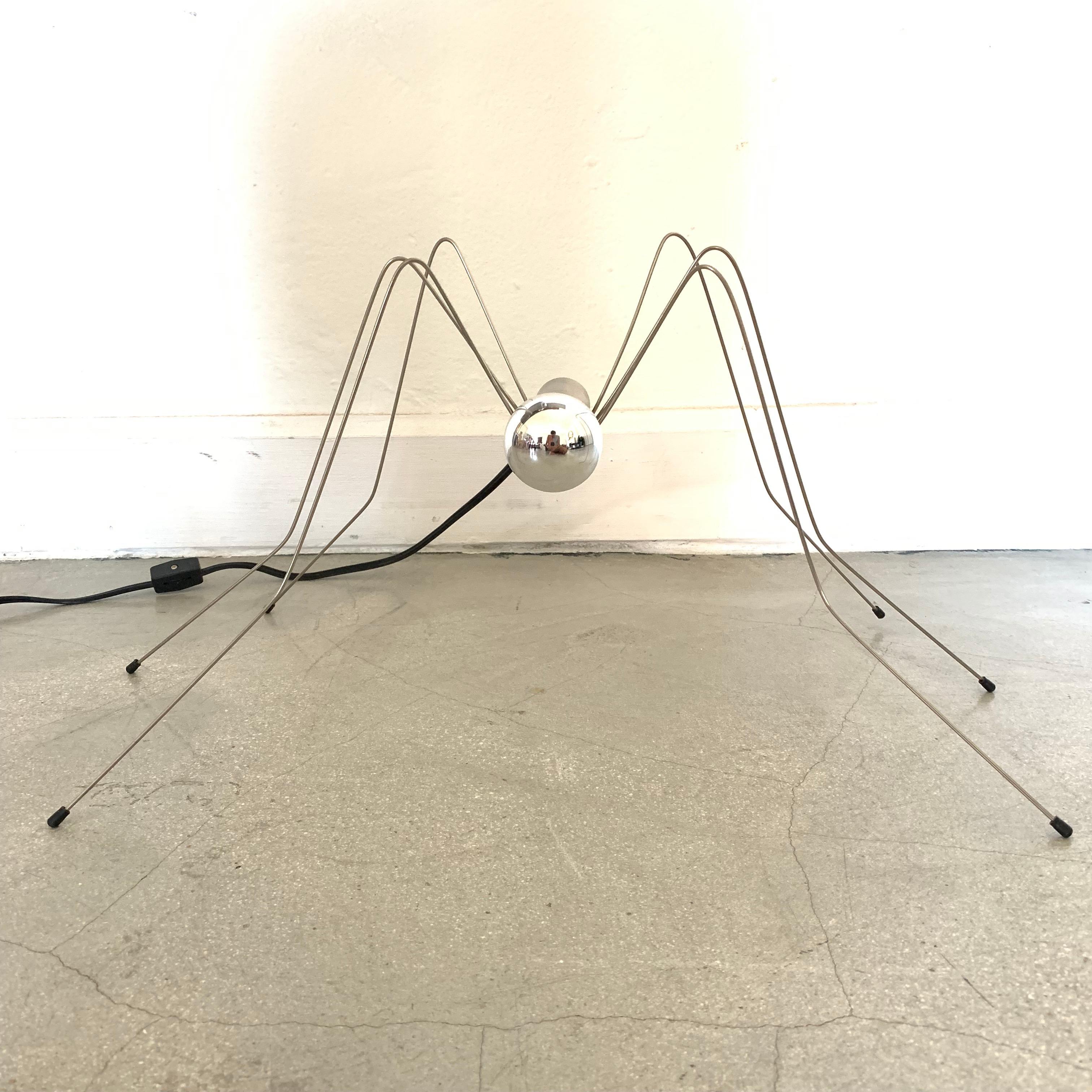 Insect shaped ant light in steel with rubber feet by Ingo Maurer, 1980s.