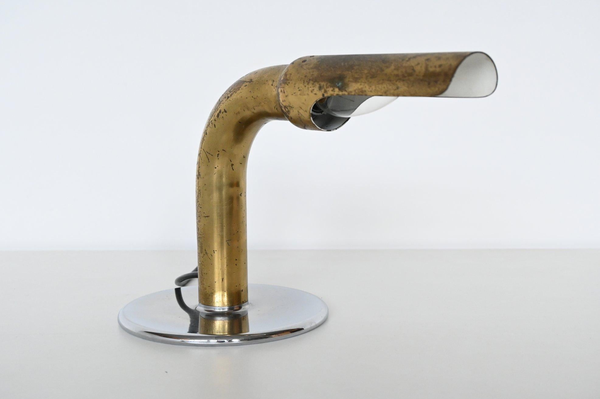 Very nice and rare Gulp desk lamp designed by Ingo Maurer for Design M, Germany, 1970. This lamp is one of the very first lamps designed by this famous designer. It has a brass bent tube connected to a round chromed base. A nice detail is the