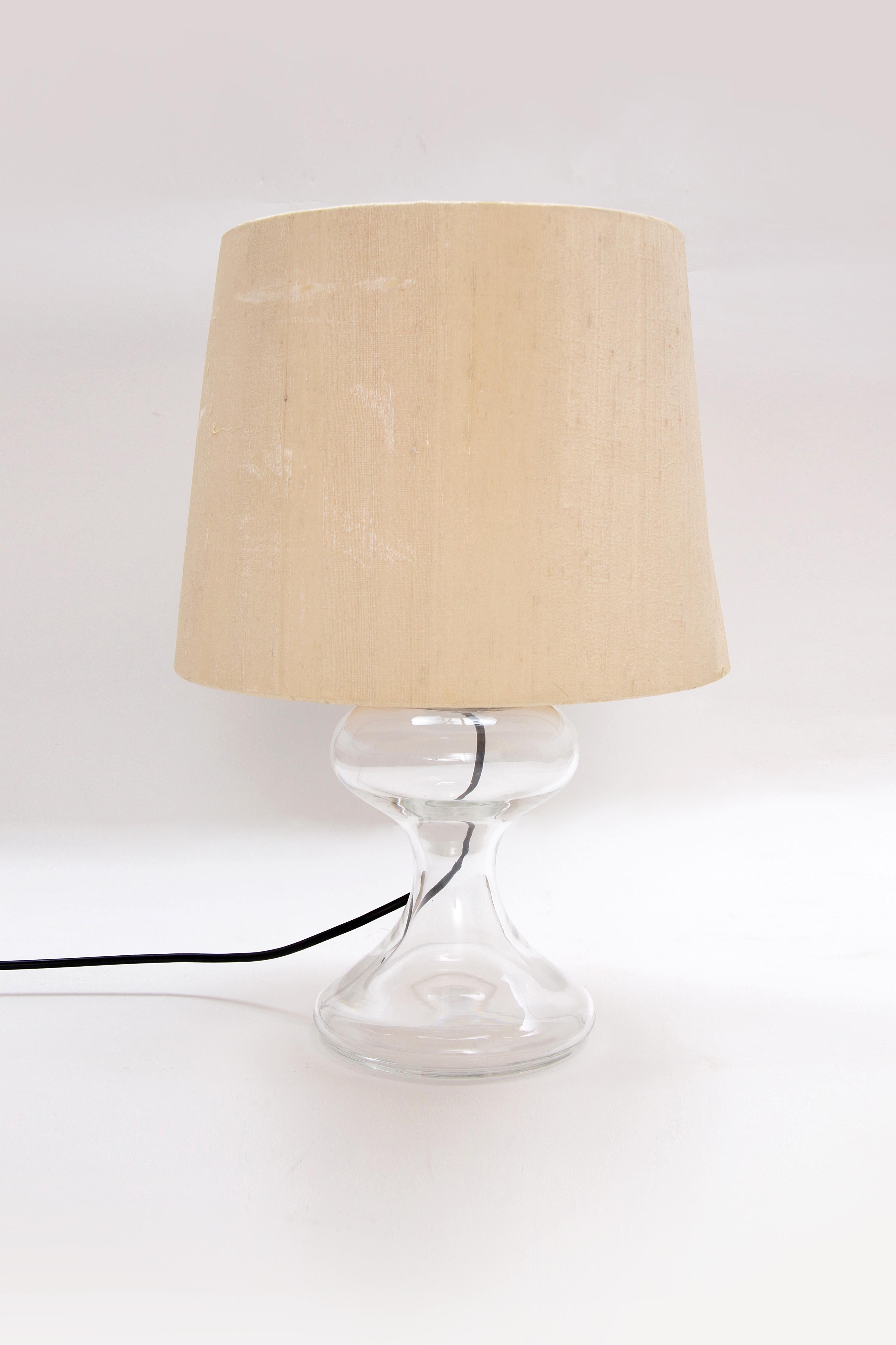 Ingo Maurer ML1 Table Lamp - Mouth-blown Design Lighting

Discover the unique beauty of the Ingo Maurer ML1 table lamp, a masterpiece of hand-blown glass that provides atmospheric lighting for any room. This exclusive lamp, produced by Design M, is