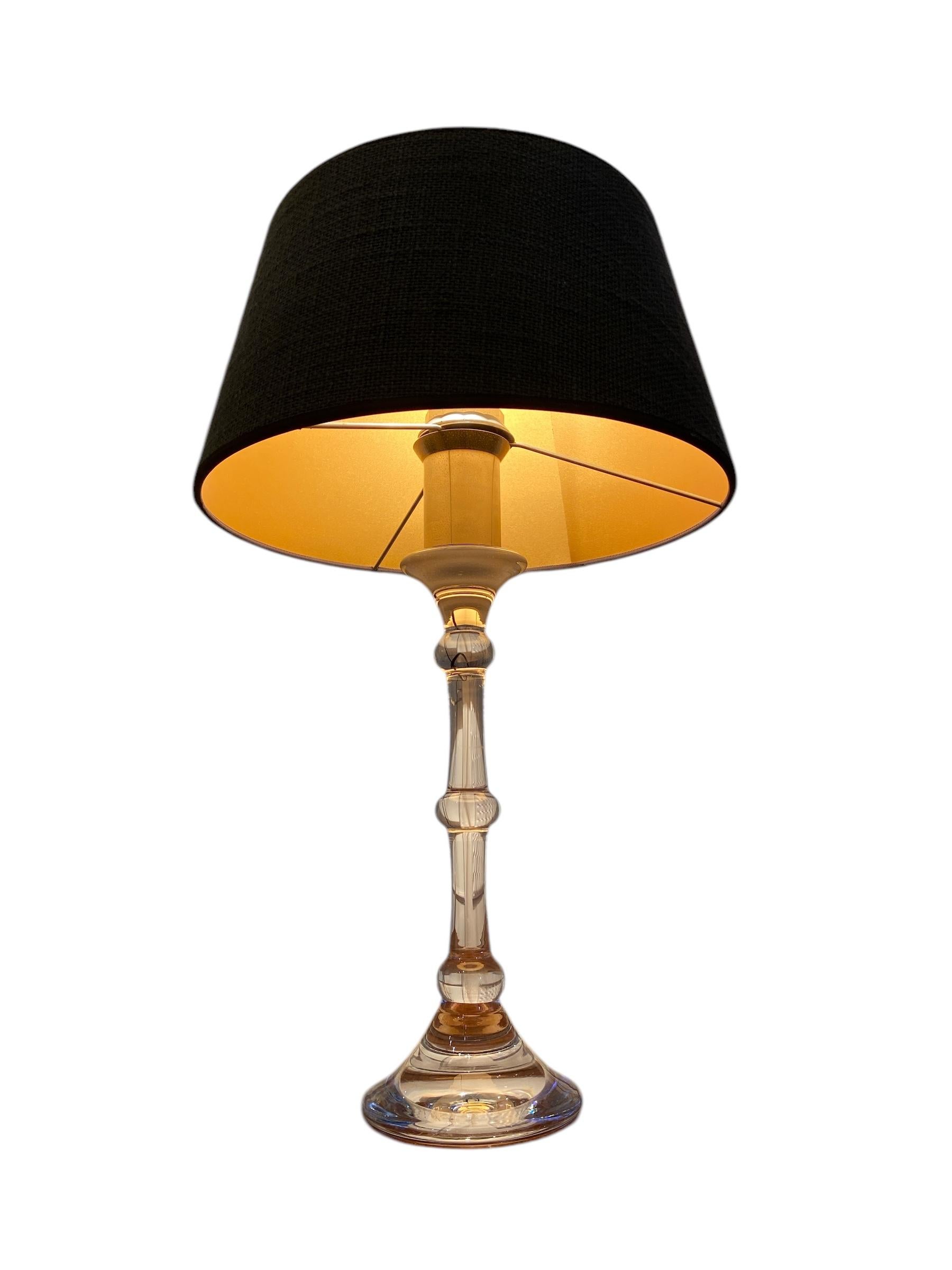 Table lamp in glass by Val Saint Lambert. Designer: Ingo Maurer.
