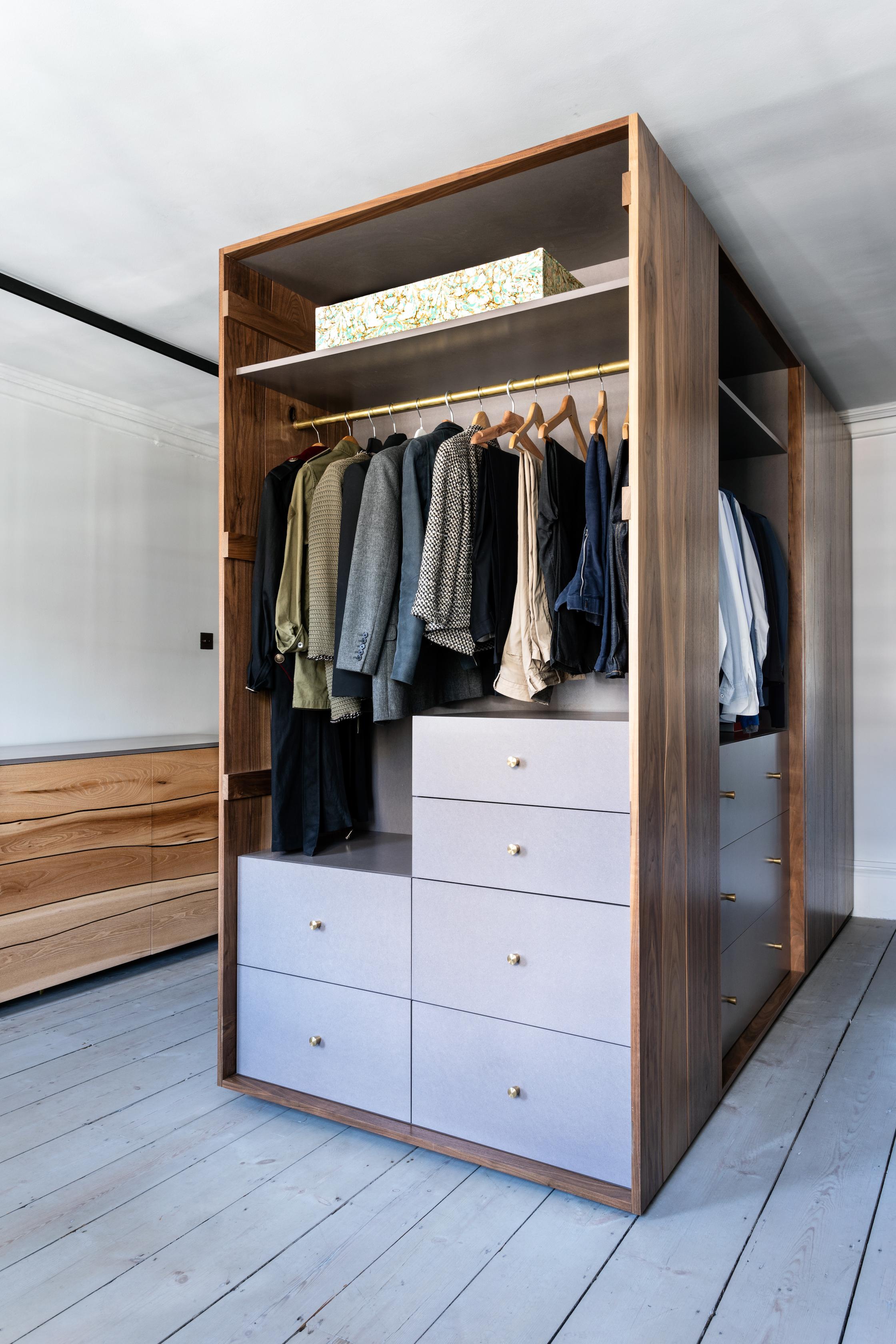 Ingrained wardrobe by Adam Blencowe
Materials: Walnut, Light Grey Valchromat, Brass Fittings
Dimensions: 210 x 240 x 120 cm

We use the Ingrained design across three pieces of furniture, wardrobes, dressers and sideboards.

Unusually for