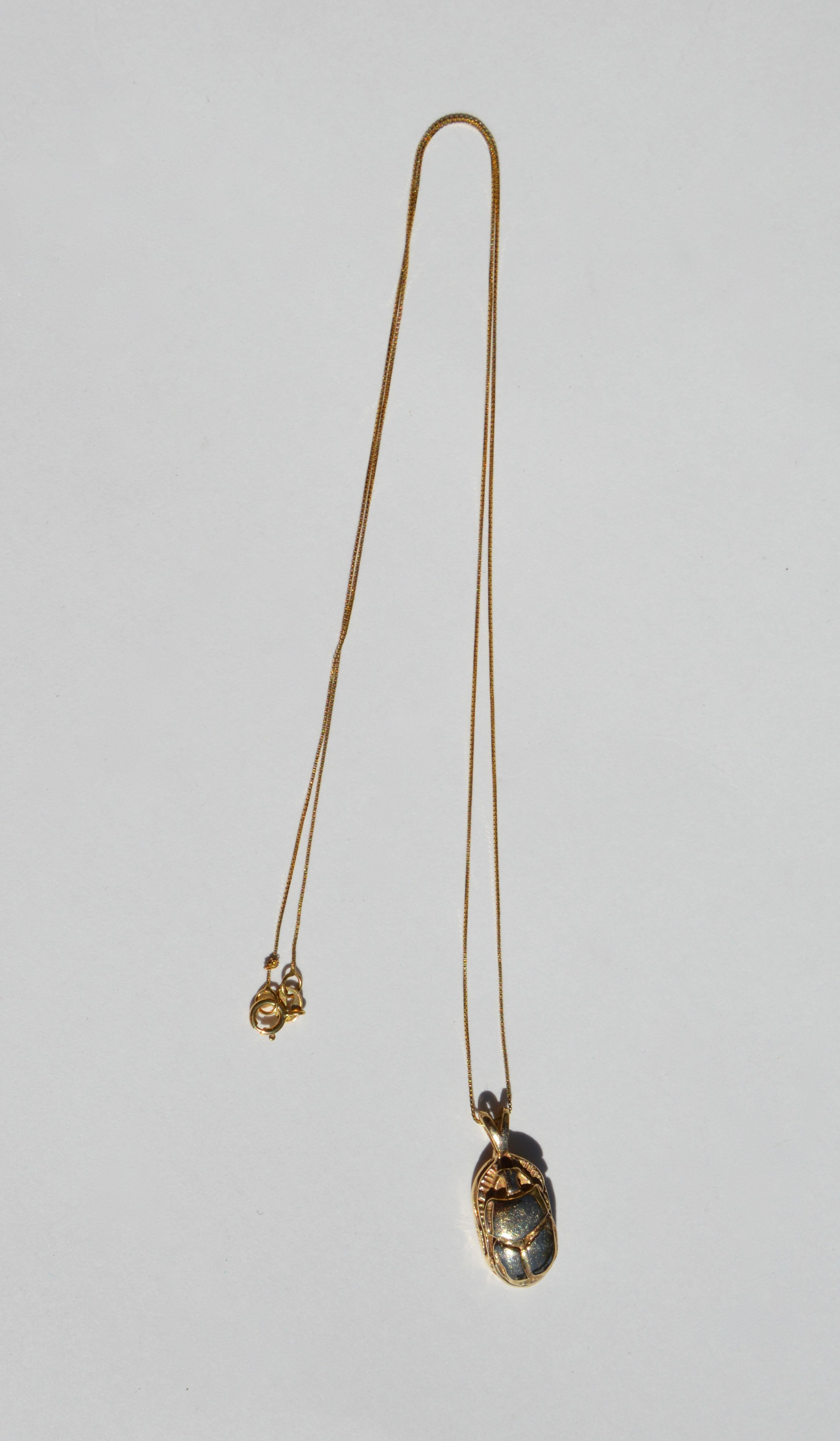 gold beetle pendant