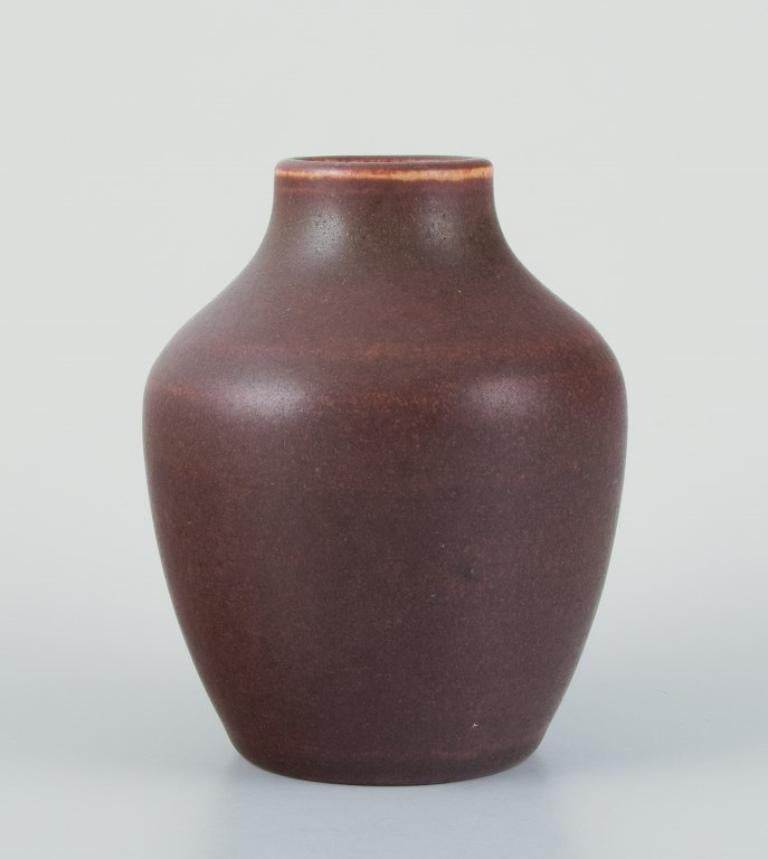 Ingrid and Erich Triller, Sweden.
Unique ceramic vase decorated with brown-toned glaze.
From the 1970s.
Signed 