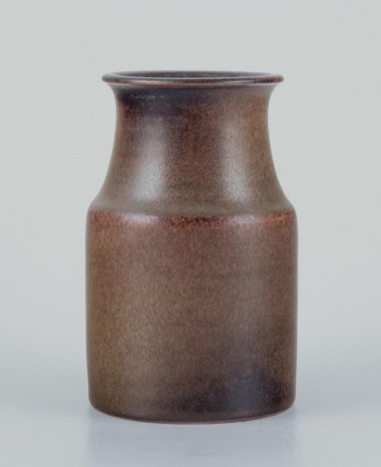 Ingrid and Erich Triller, Sweden.
Unique ceramic vase decorated with green-brown toned glaze.
From the 1970s.
Signed 