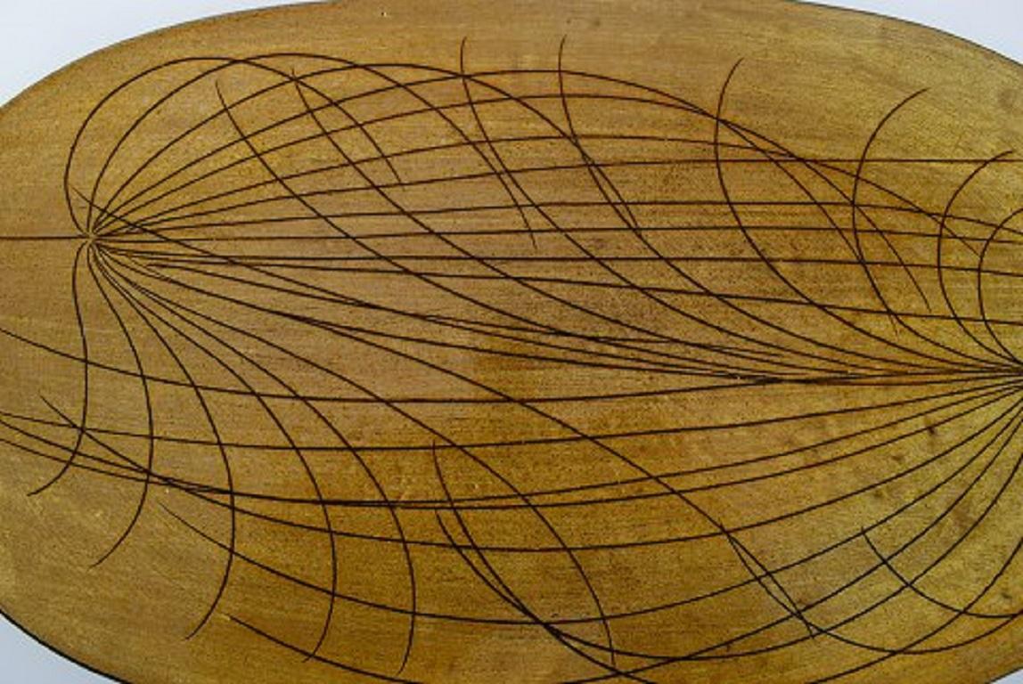 Ingrid Atterberg for Uppsala Ekeby. Large oval Papyrus dish in glazed stoneware. Mid-20th century.
In very good condition.
Measures: 41 x 24.5 cm.
Stamped.