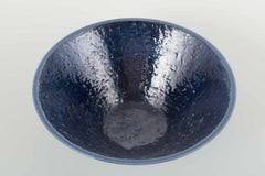 Ingrid Atterberg for Upsala-Ekeby. Conical stoneware bowl with dark blue glaze.
