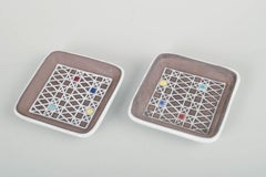 Ingrid Atterberg for Upsala-Ekeby. Two faience dishes with relief decoration.