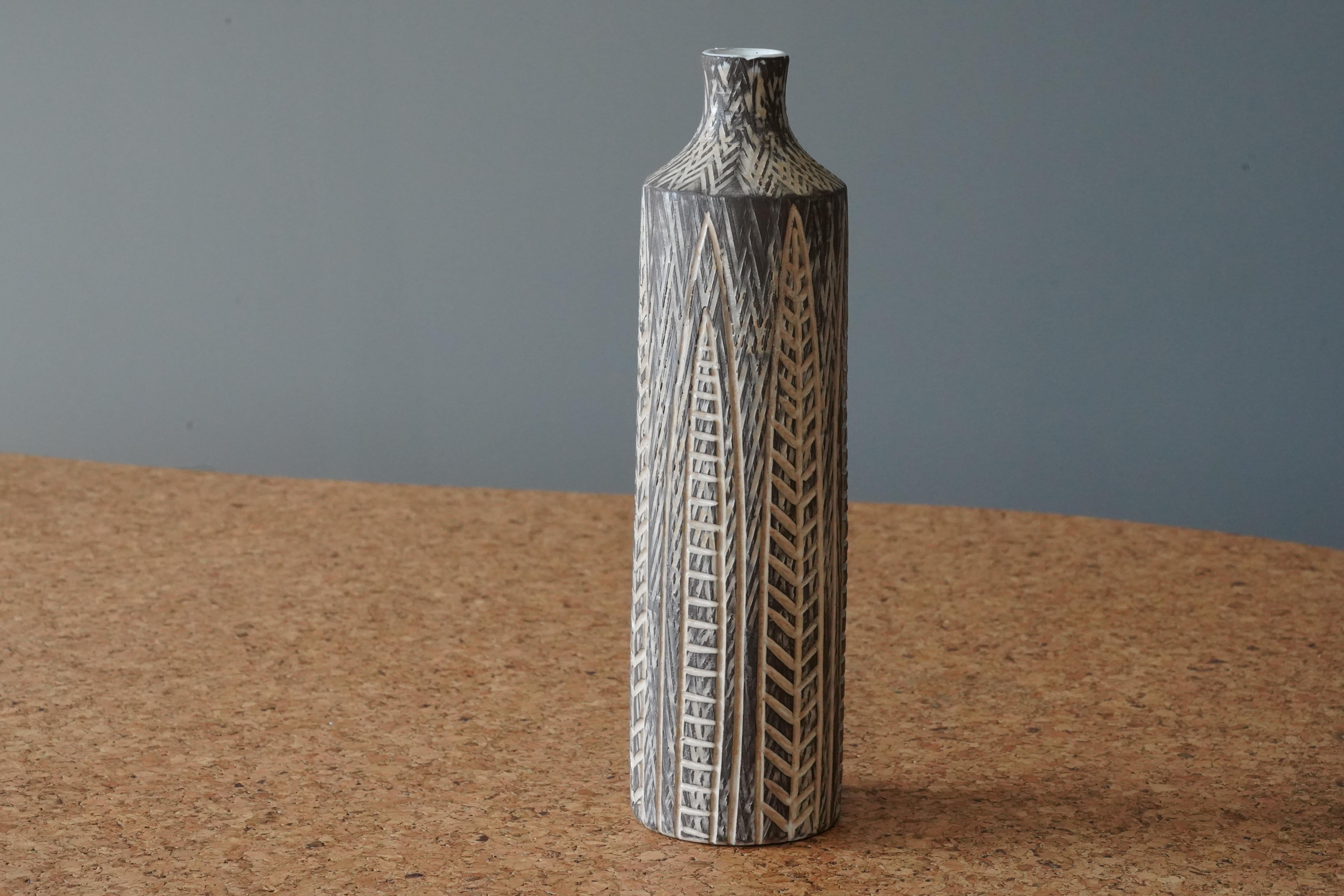A vase designed by Mari Simmulson for Upsala Ekeby, Sweden, 1950s. With incised decor.

 