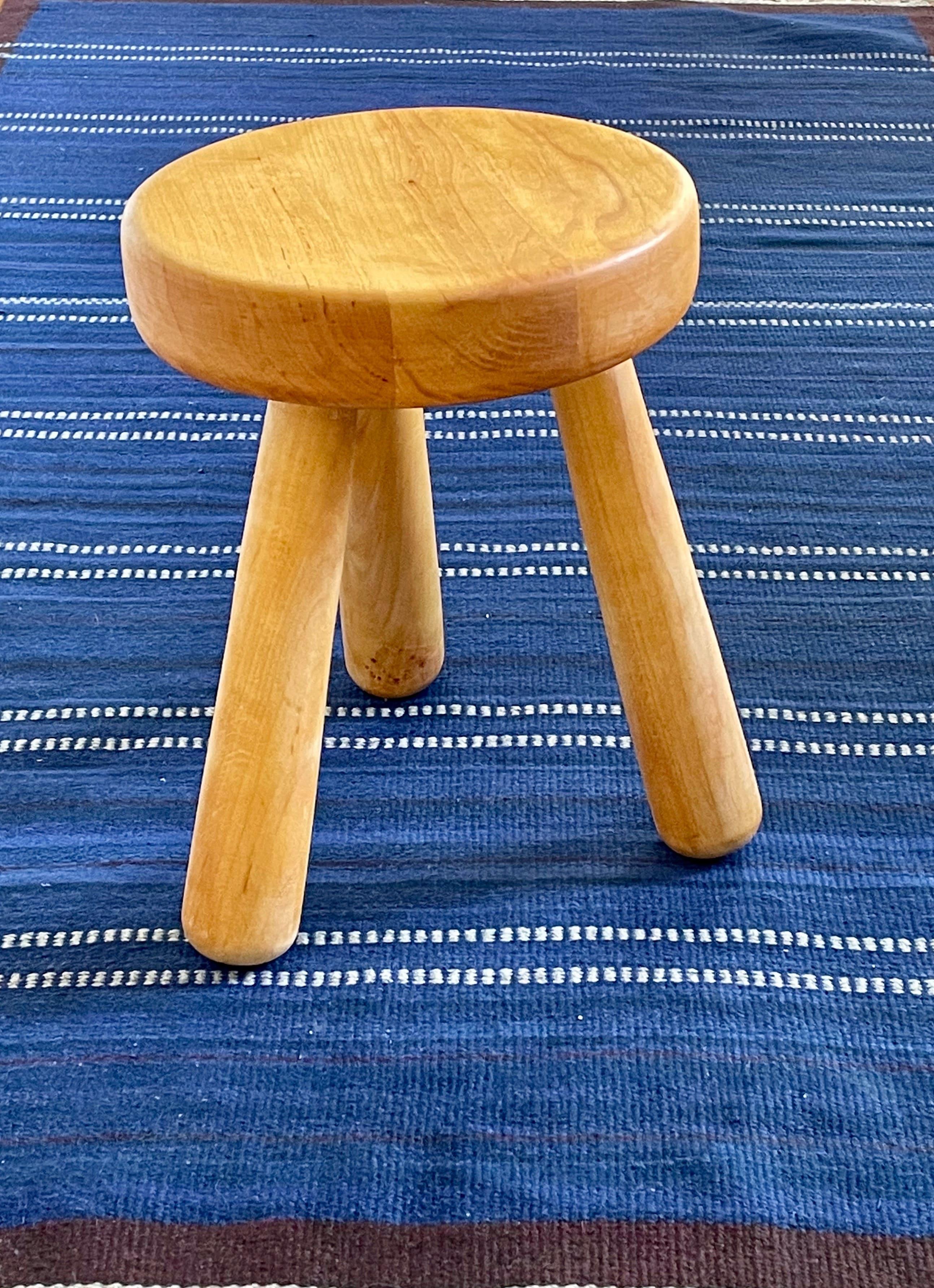 High Ingvar Hildingsson stool made in solid alder wood during the end of the XX century. The stool is high for its the model. The stool is in good condition and it's stamp and labeled by the artist.