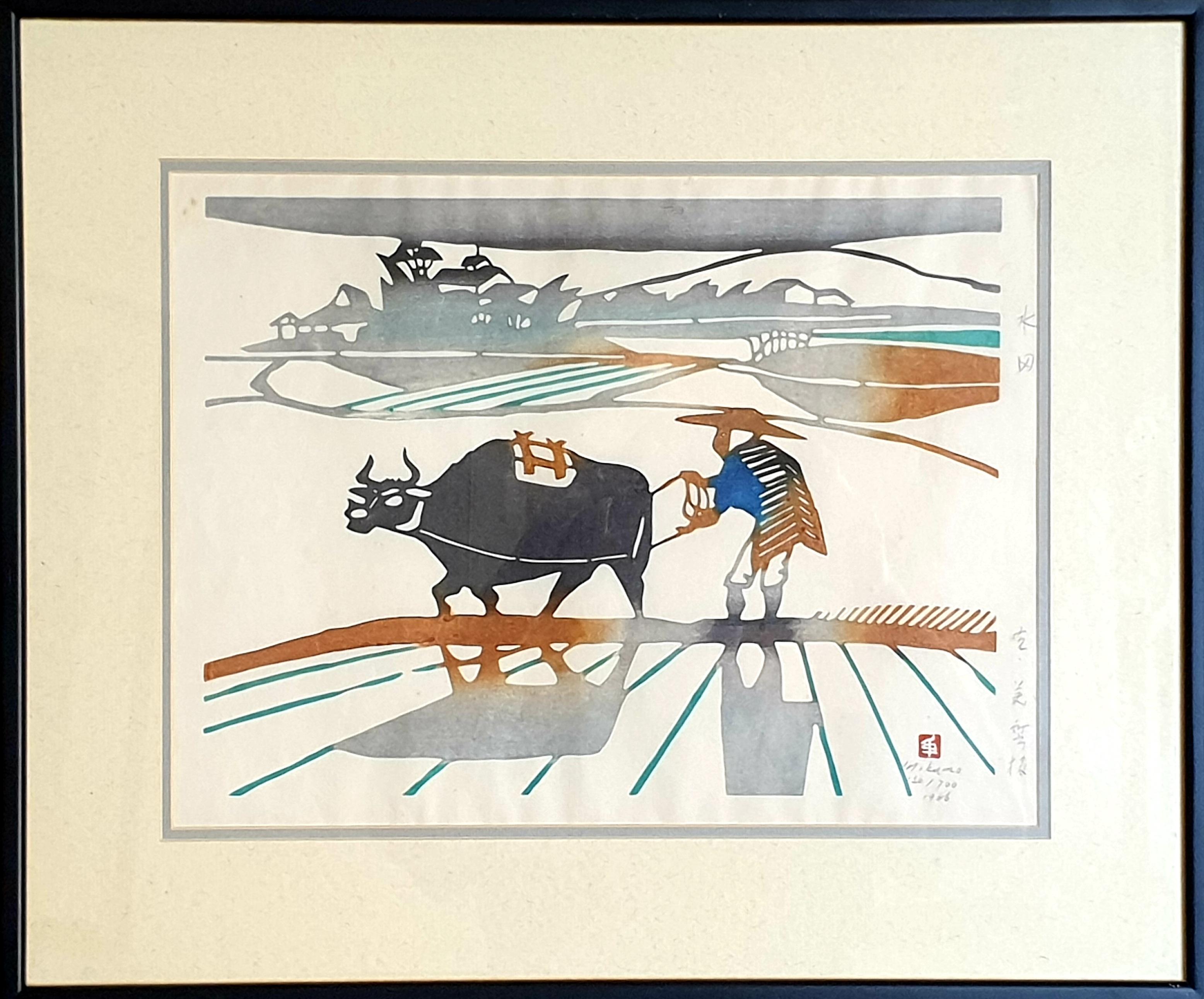 Mid-Century coloured woodblock print of 'ploughing the fields' by 20th century Japanese artist Ini Kumo. The print is hand-signed in pencil, dated 1966 and numbered 130/700 to the bottom right and presented under glass in a black wooden frame. 

A