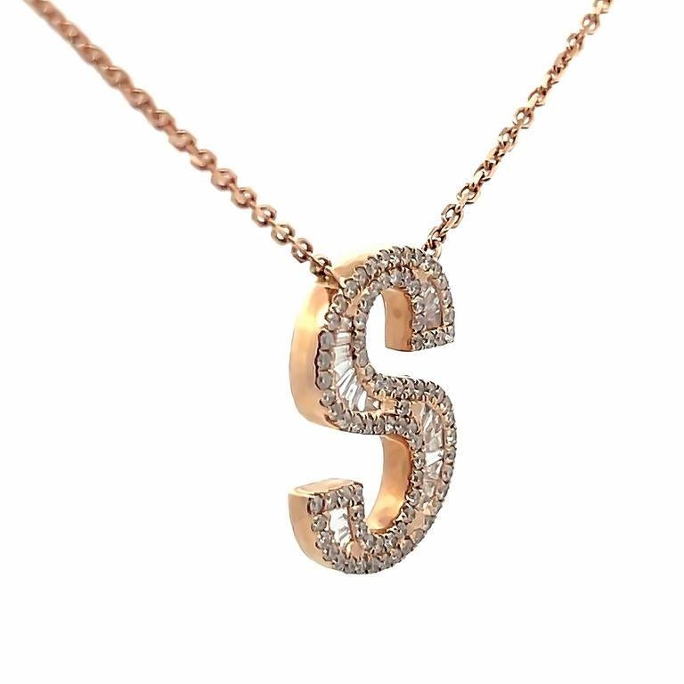 Introducing our exquisite diamond pendant necklace with a captivating letter S, this design is created using white diamonds in two different shapes, baguette, and round, with a total carat of 0.50 carats. These diamonds are G color with SI clarity.