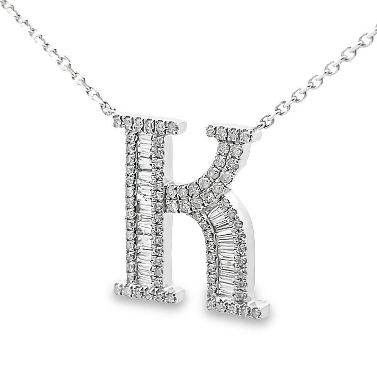 Introducing our exquisite diamond pendant necklace with a captivating letter K, this design is created using white diamonds in two different shapes, baguette, and round, with a total carat of 0.62 carats. These diamonds are G color with SI clarity.