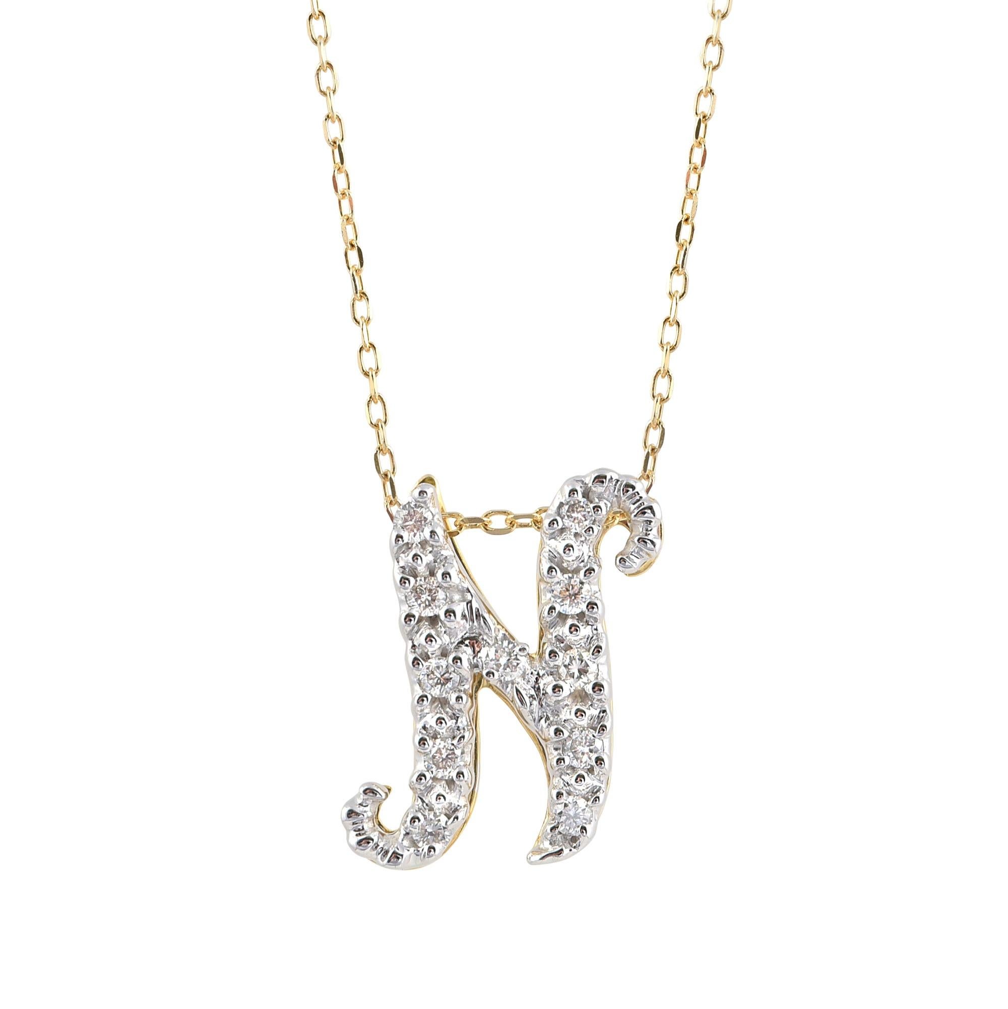 Découvrez le charme exquis de ce pendentif à l'initiale 