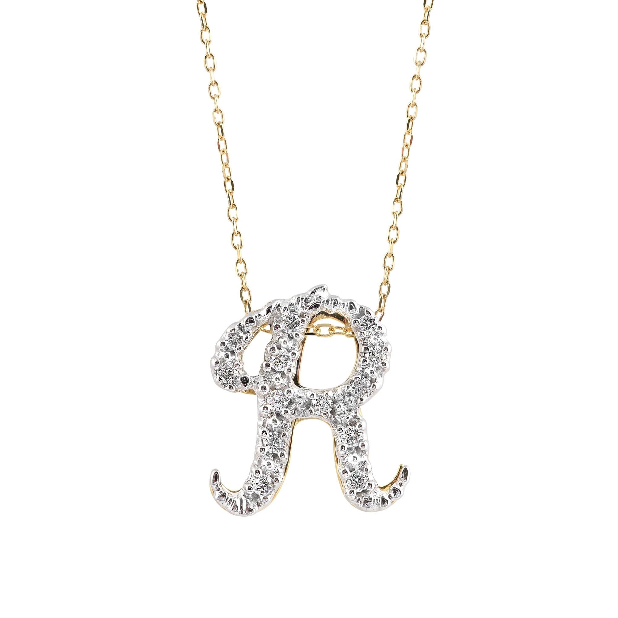 Découvrez le charme exquis de ce pendentif à l'initiale 