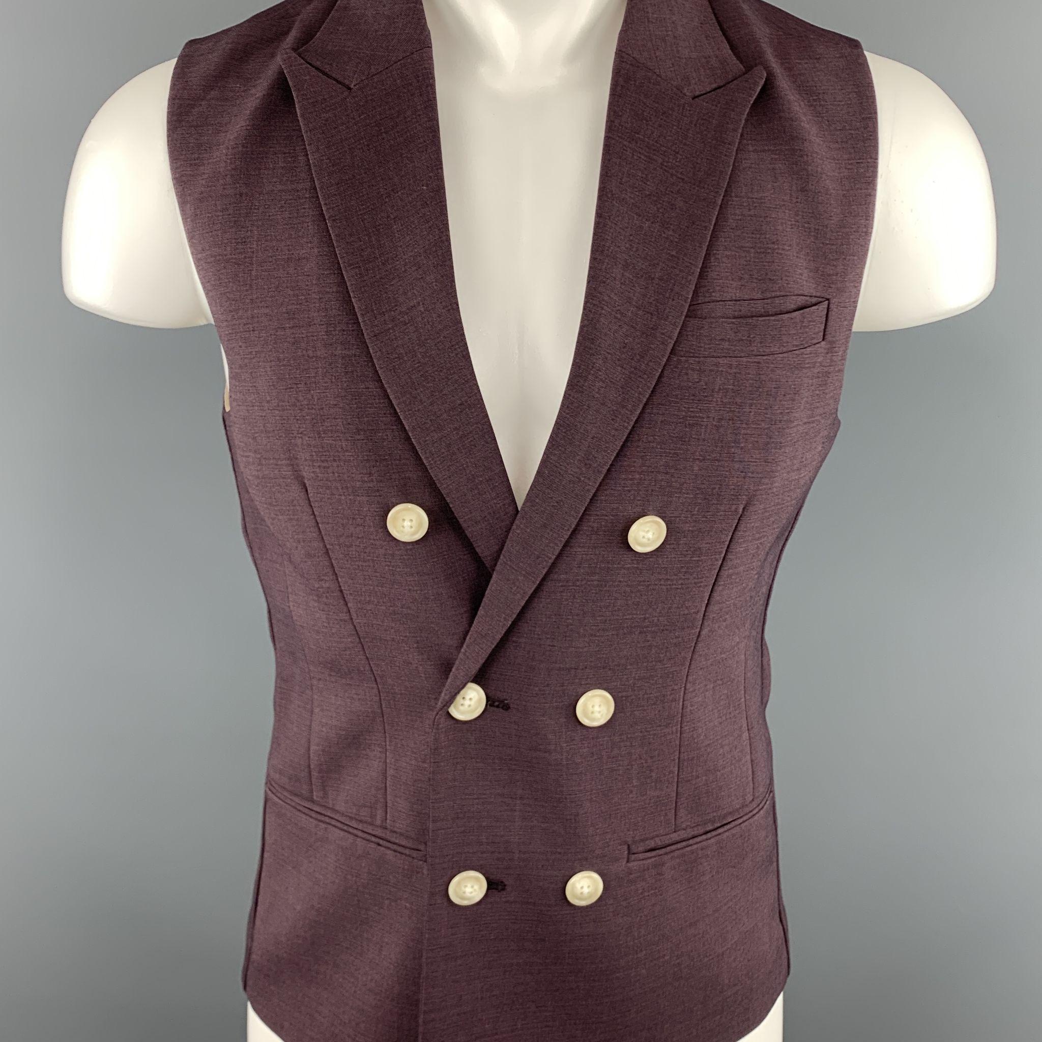 Initial vest comes in a eggplant polyester blend featuring a double breasted style, peak lapel, slit pockets, and a single vent.

Excellent Pre-Owned Condition.
Marked: No size

Measurements:

Shoulder: 14 in. 
Chest: 34 in. 
Length: 24 in. 

SKU: