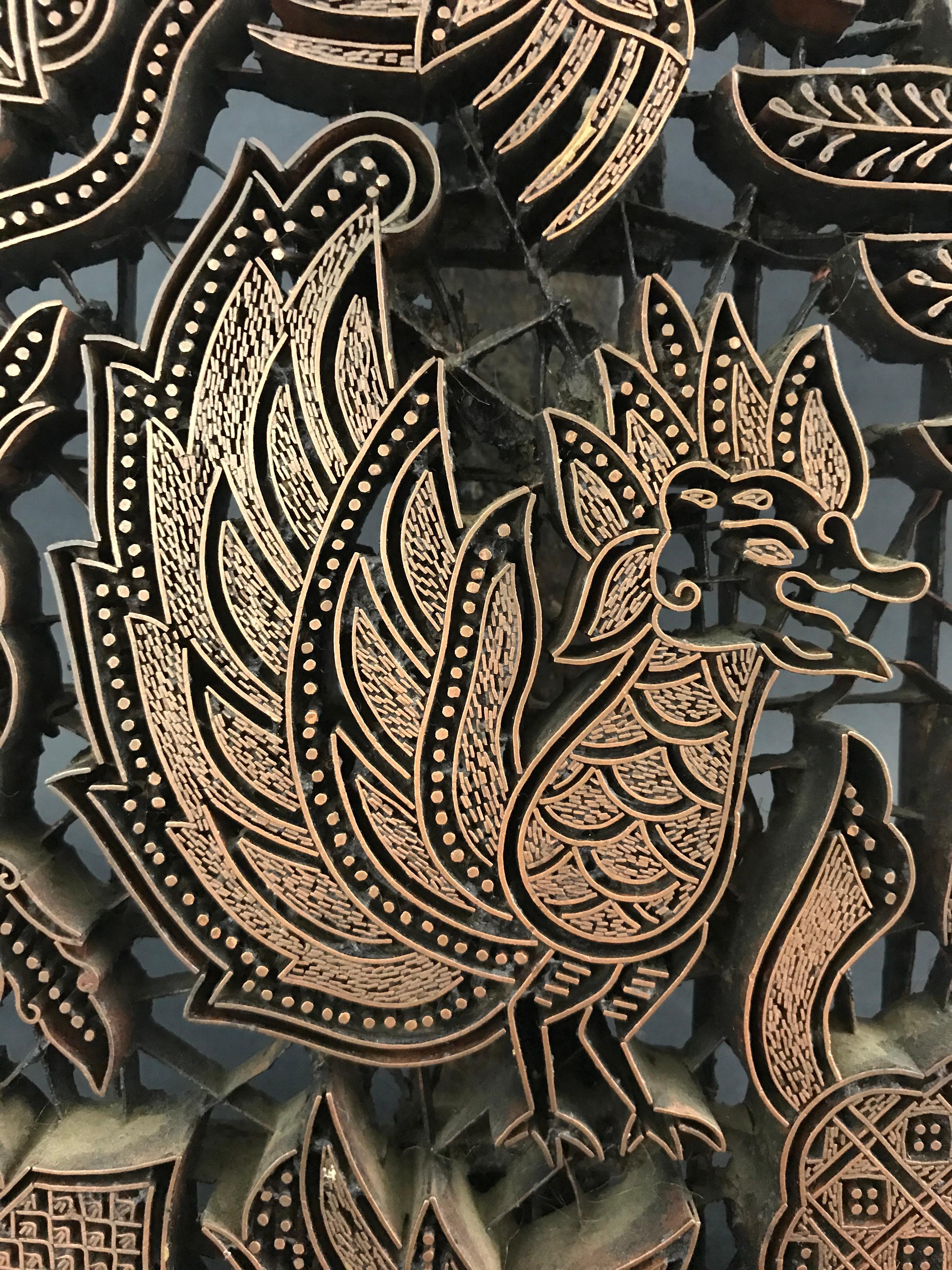 Timbre composé d'un ensemble de petites plaques de cuivre soudées formant un motif d'oiseau. Ces timbres devaient être imprimés sur la draperie.
Travail indien, vers 1900.