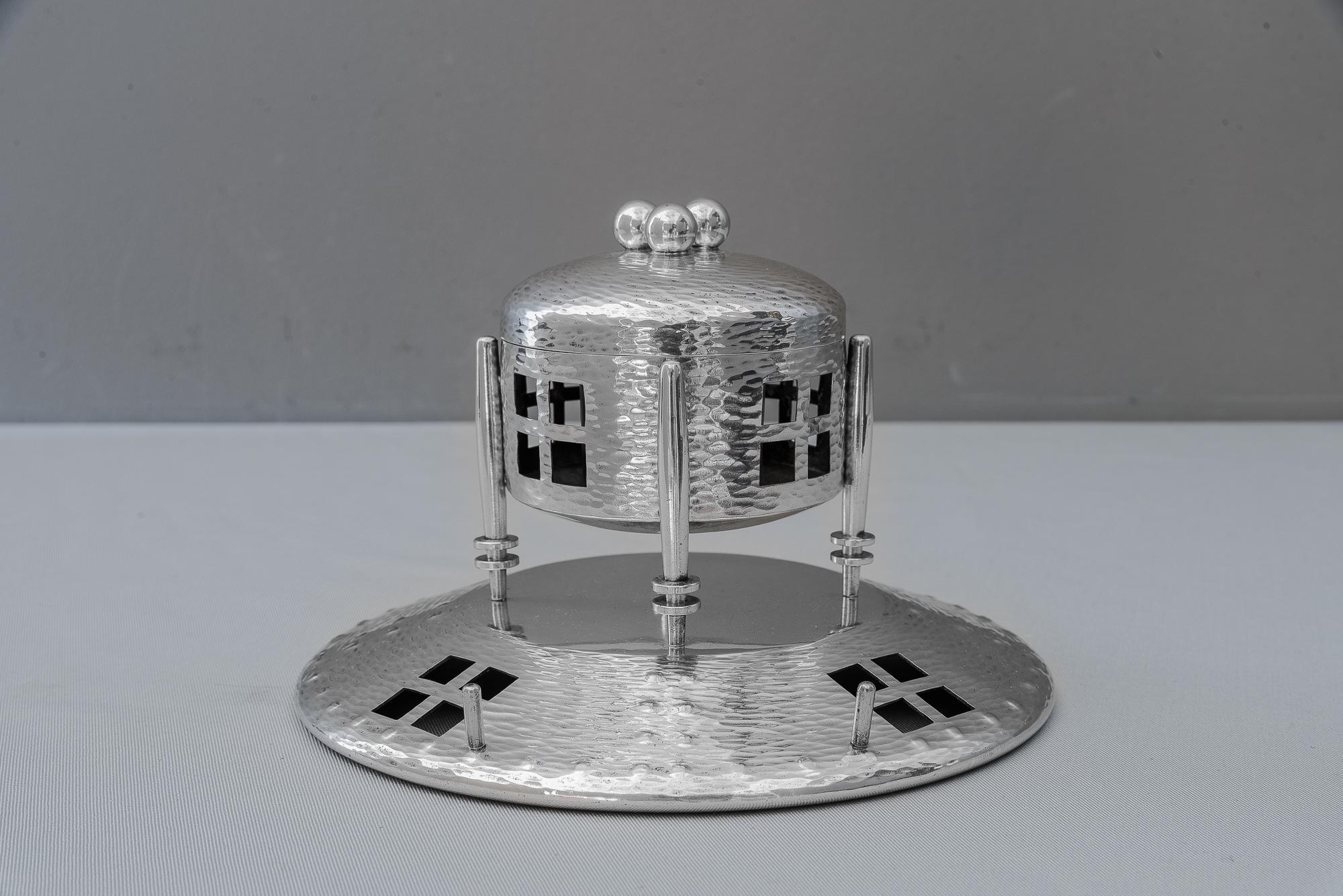 Ink well attributed to Hans Ofner.
Alpacca, silver plated.
Original glass.