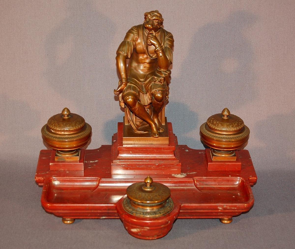 After Michelangelo Laurent de' Medici, spectacular red marble inkwell surmounted by a sculpture and three bronze cups with brown patina. Signed F Barbedienne founder, Collas Paris mechanical reduction stamp. Dated 1880. Perfect condition.
