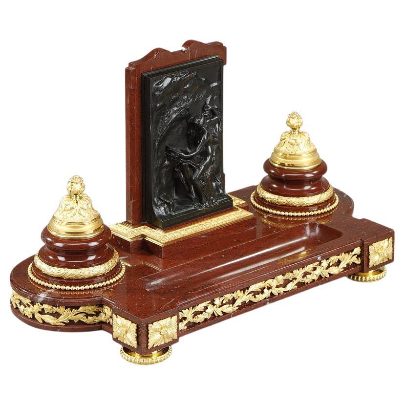 Inkwell in red marble with  "Allegory of writing" in gilt bronze, signed H.CHAPU