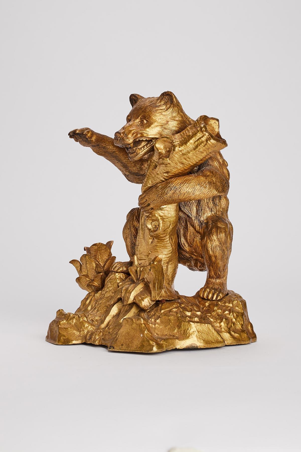 Inkwell gold guild bronze sculpture depicting a bear that is leaning on a tree trunk. Russia, 1880 ca.